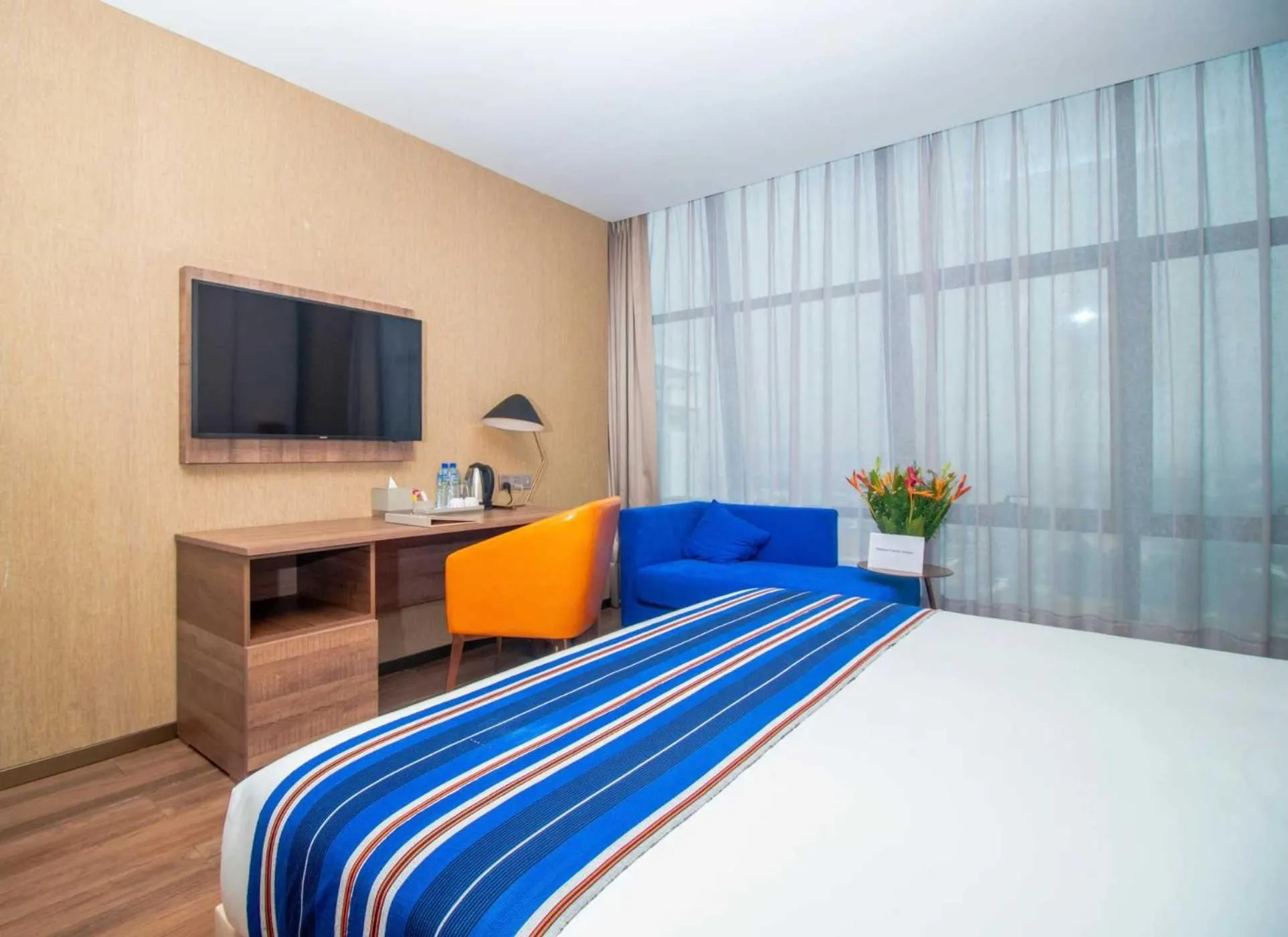 Bed in CIKA GOLDEN HOTEL and SUITES