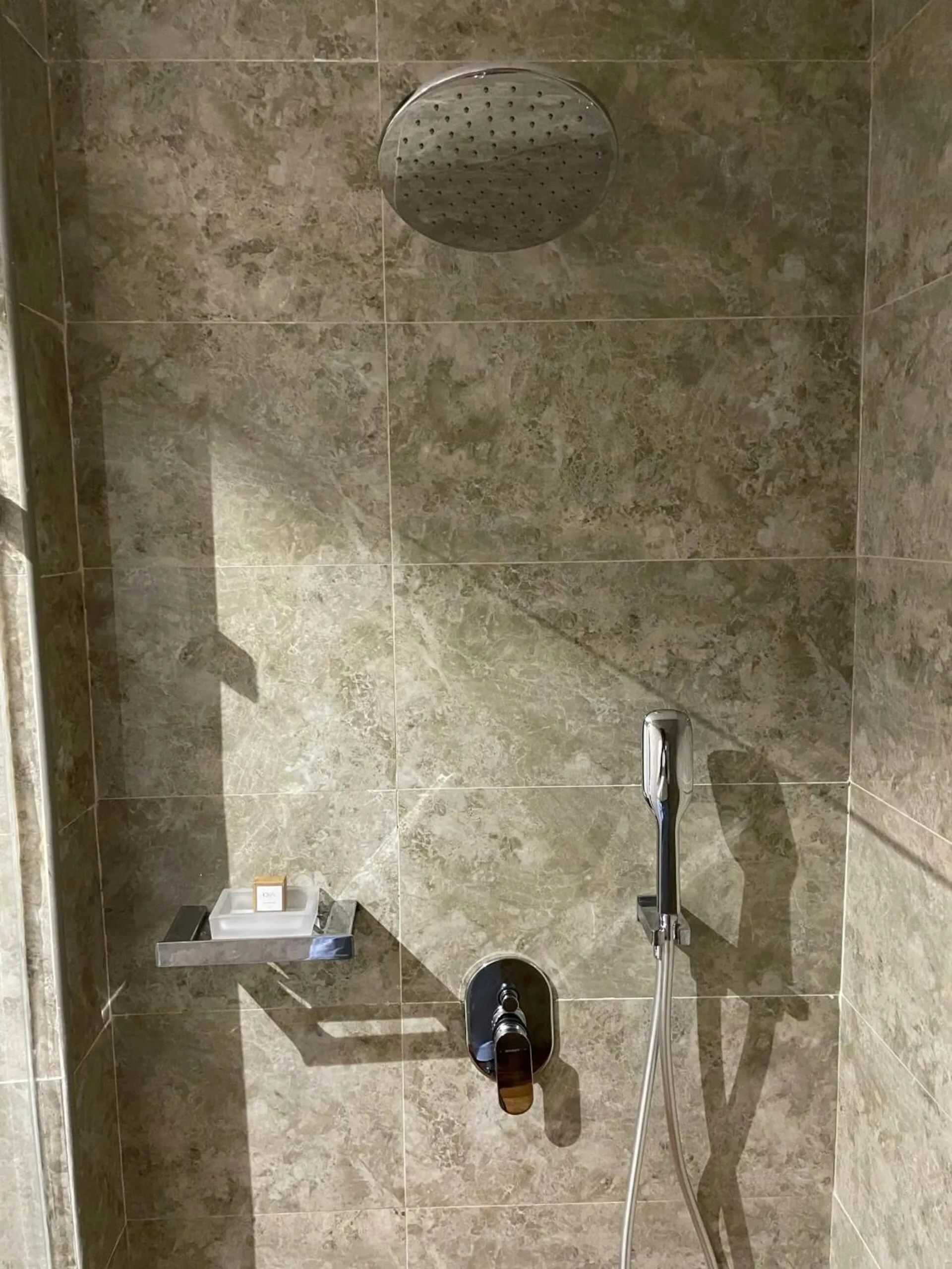 Shower in CIKA GOLDEN HOTEL and SUITES