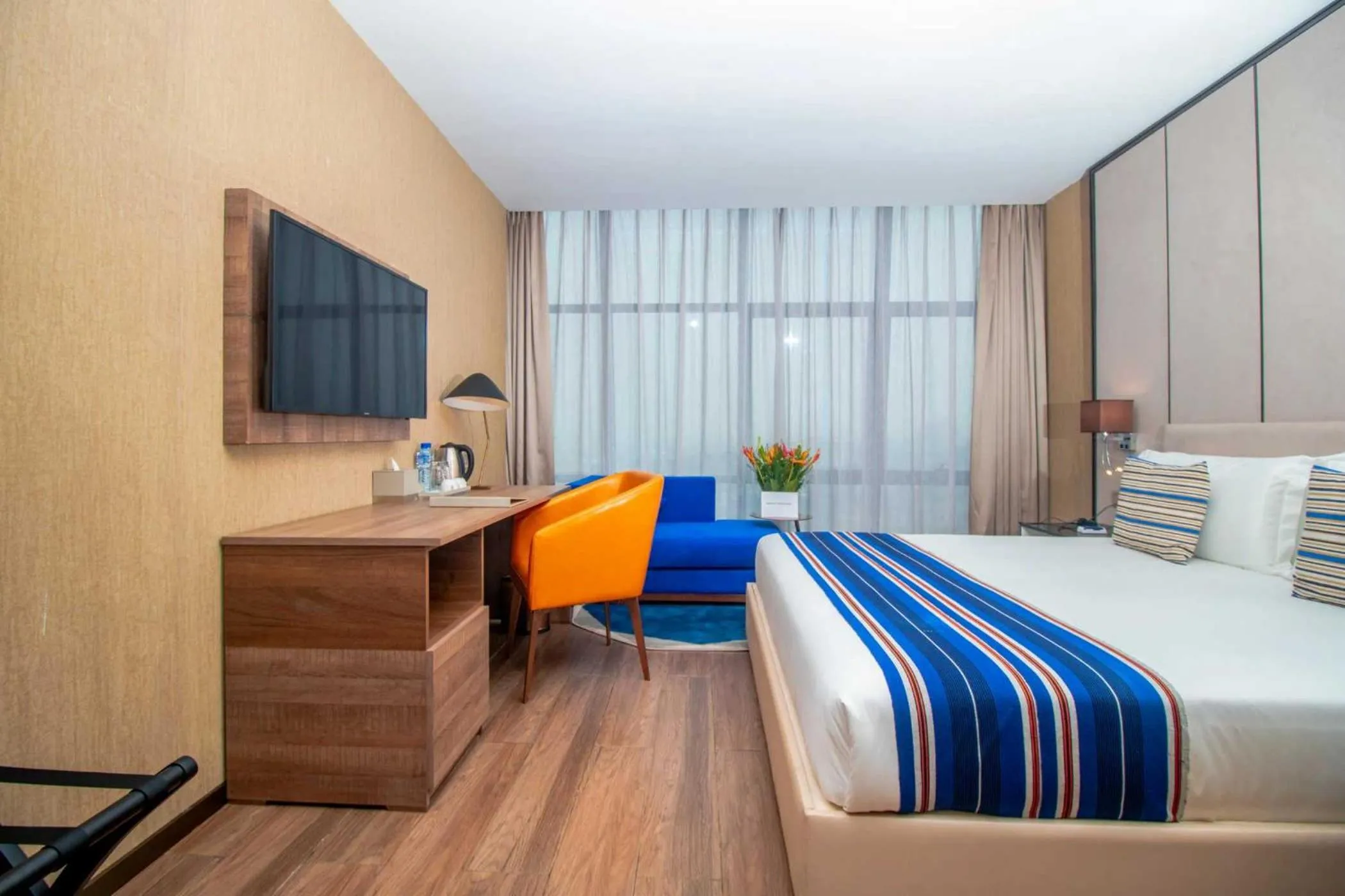 Photo of the whole room, Bed in CIKA GOLDEN HOTEL and SUITES