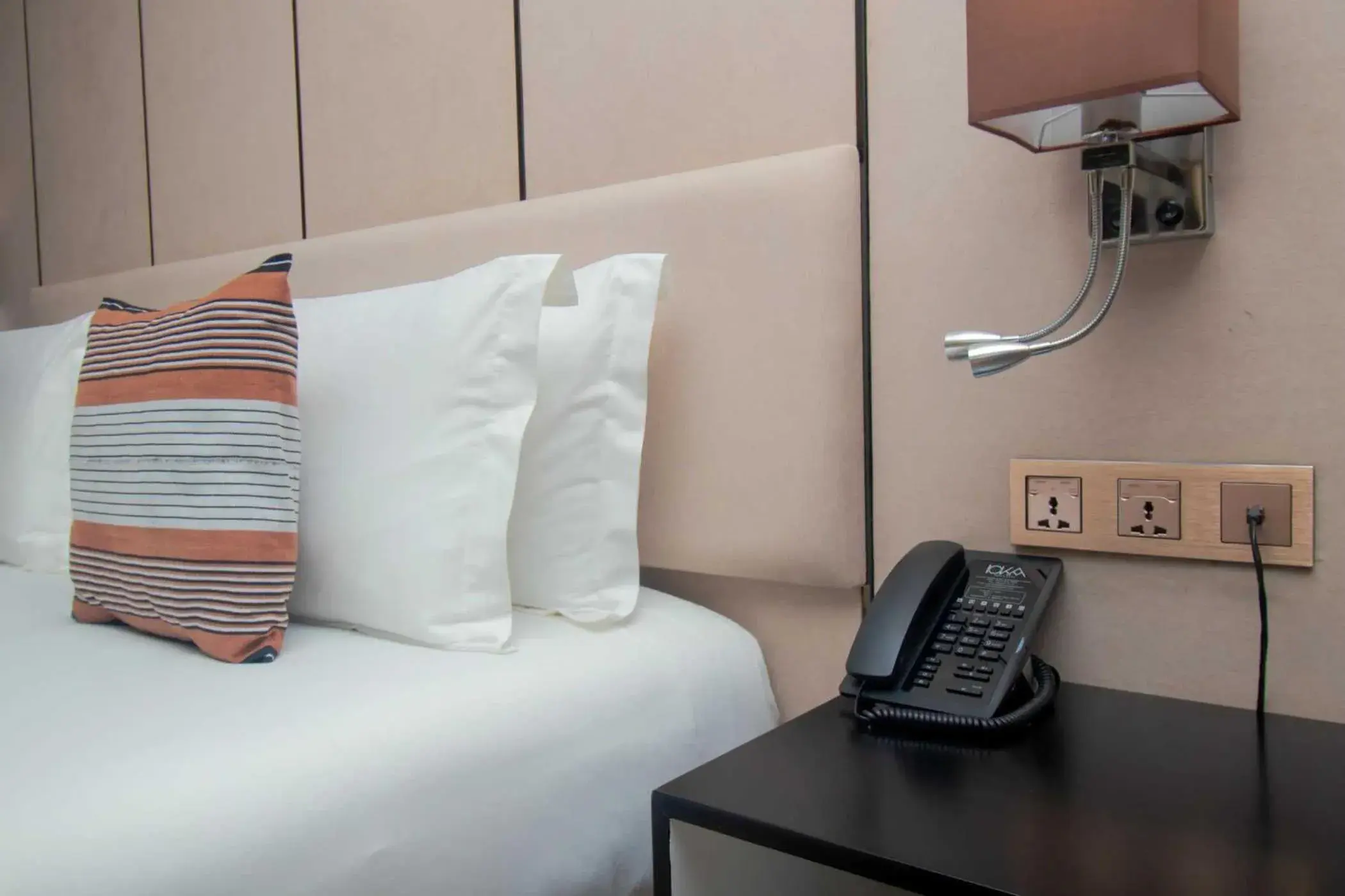 Bed in CIKA GOLDEN HOTEL and SUITES Bed in CIKA GOLDEN HOTEL and SUITES