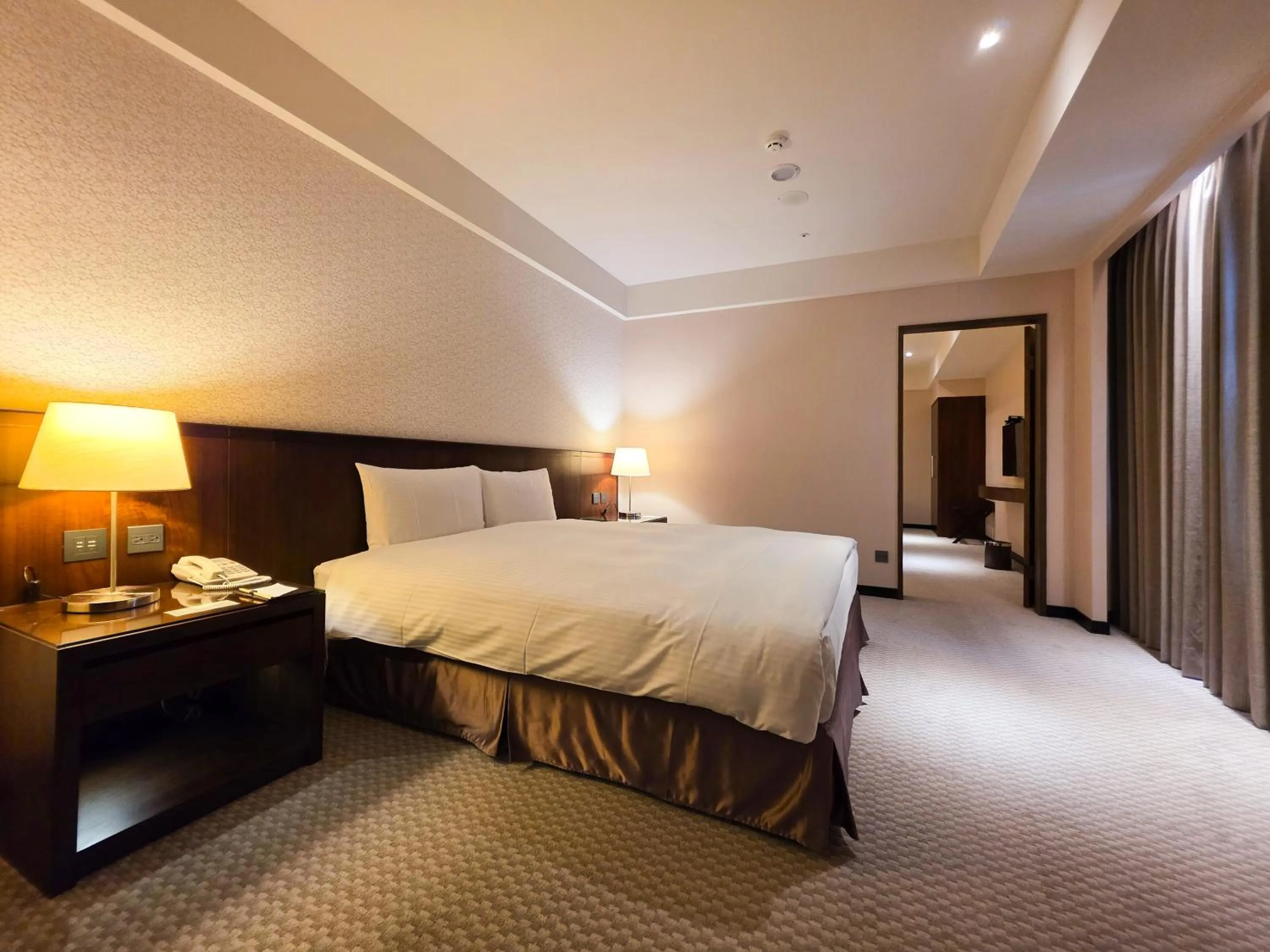 Bed in 雀客旅館台中來來