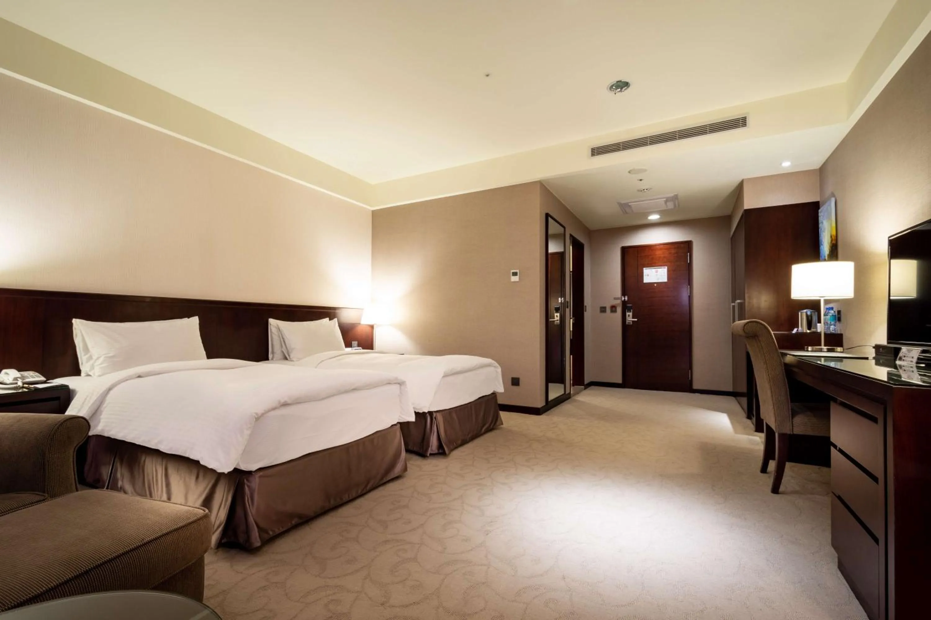 Bed in 雀客旅館台中來來