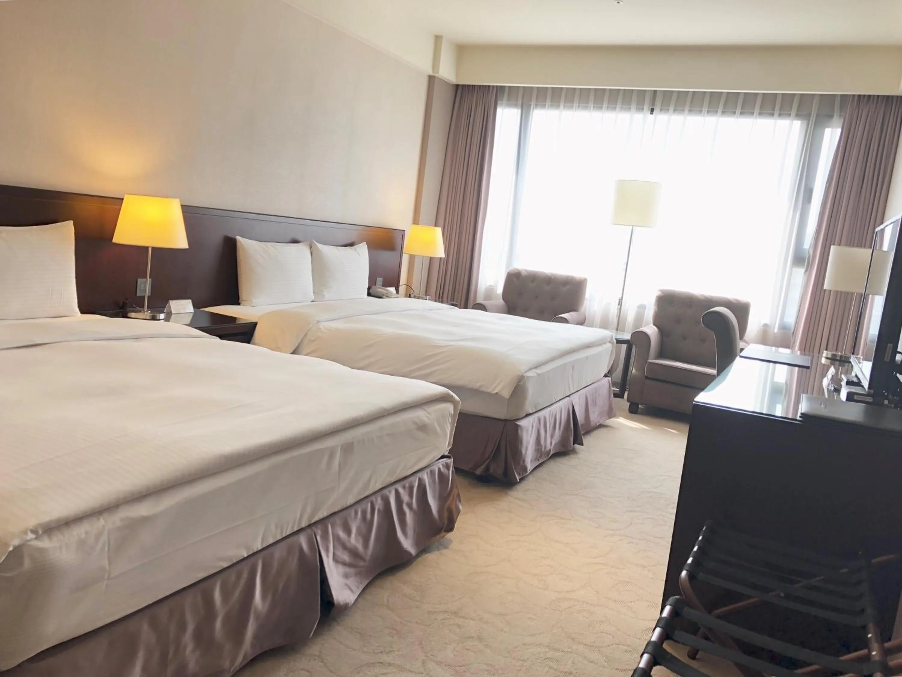 Bed in 雀客旅館台中來來