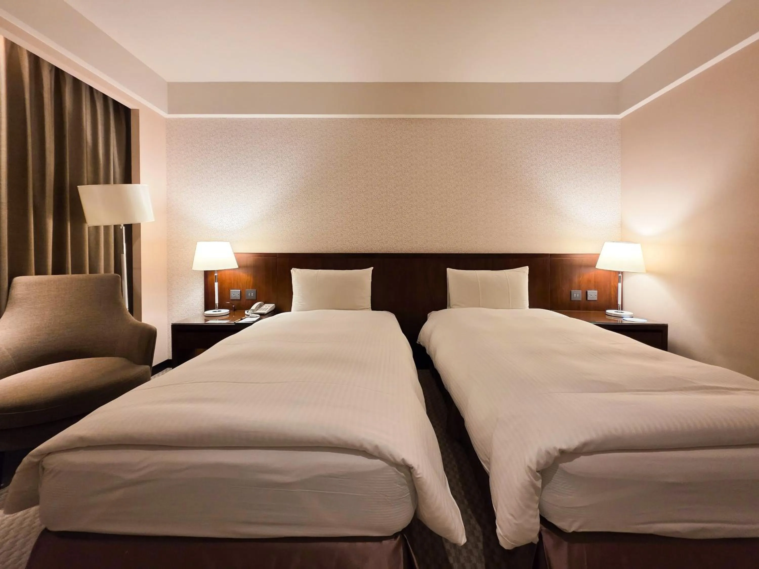 Bed in 雀客旅館台中來來