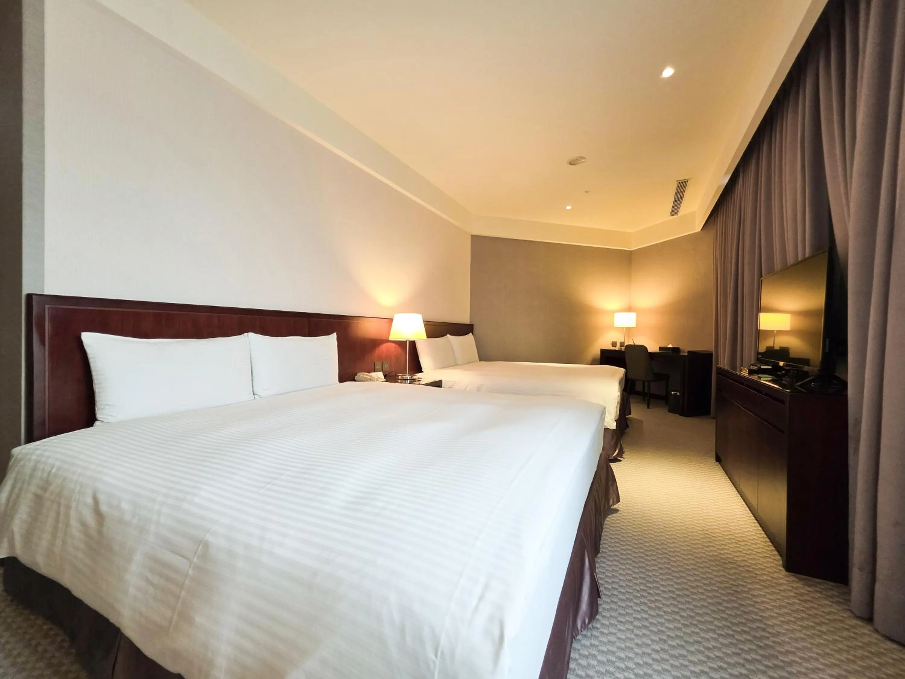 Bed in 雀客旅館台中來來