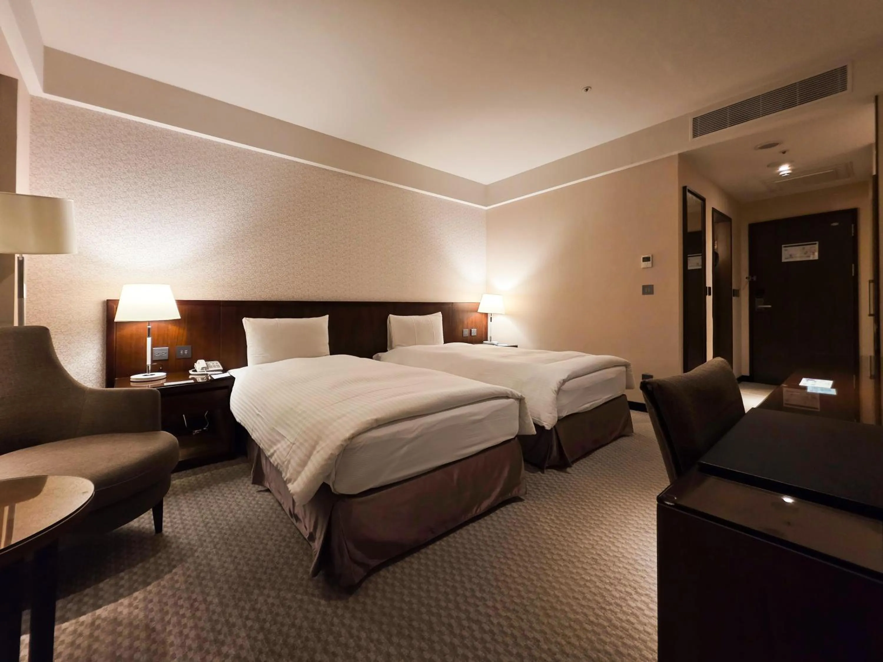 Bed in 雀客旅館台中來來