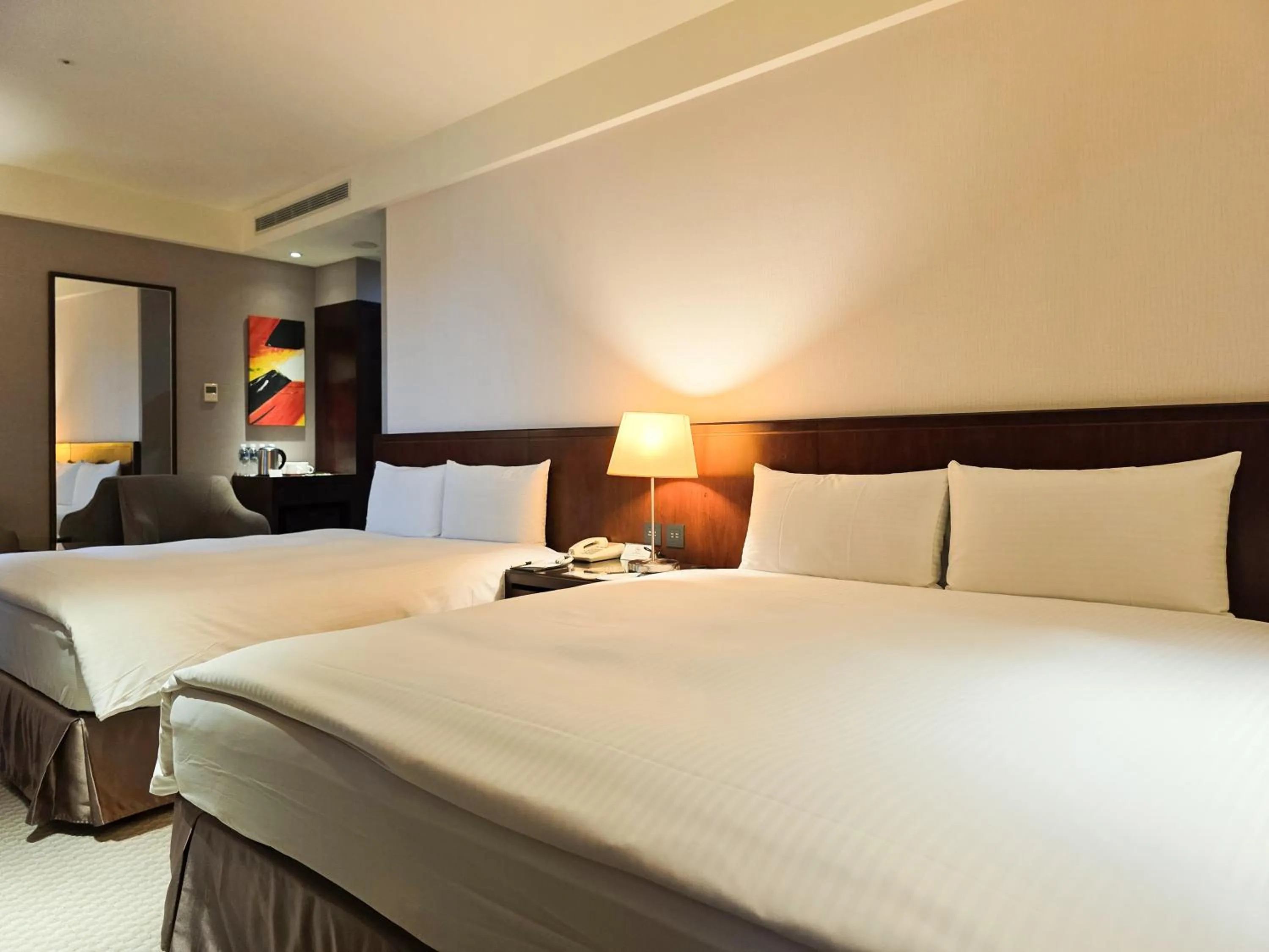 Bed in 雀客旅館台中來來