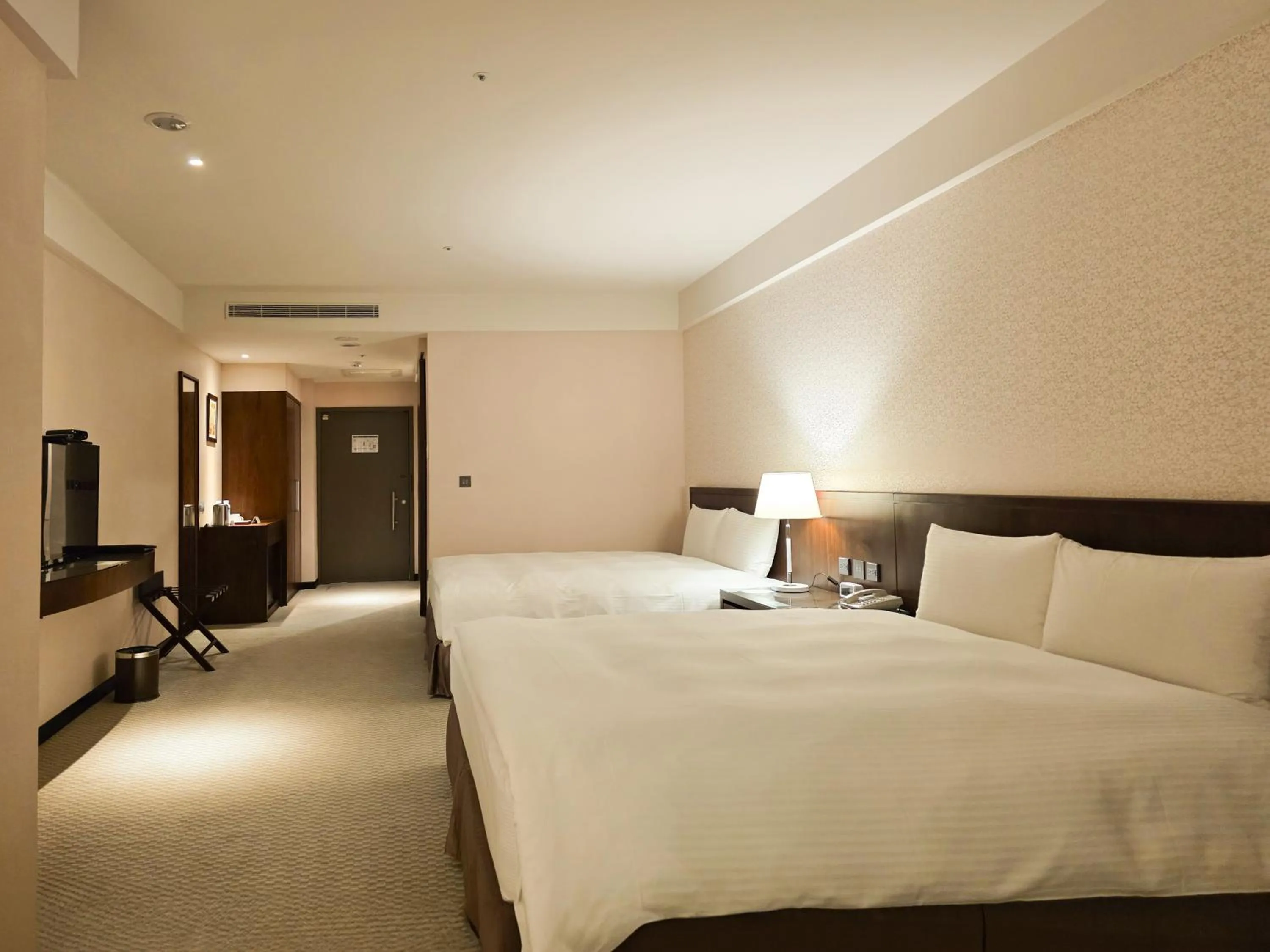 Bed in 雀客旅館台中來來