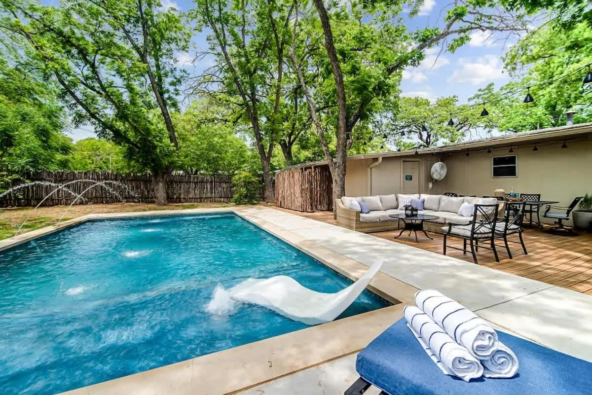 Swimming pool in Backyard Oasis w/Pool, Hot-Tub, Grill & Fire Pit!