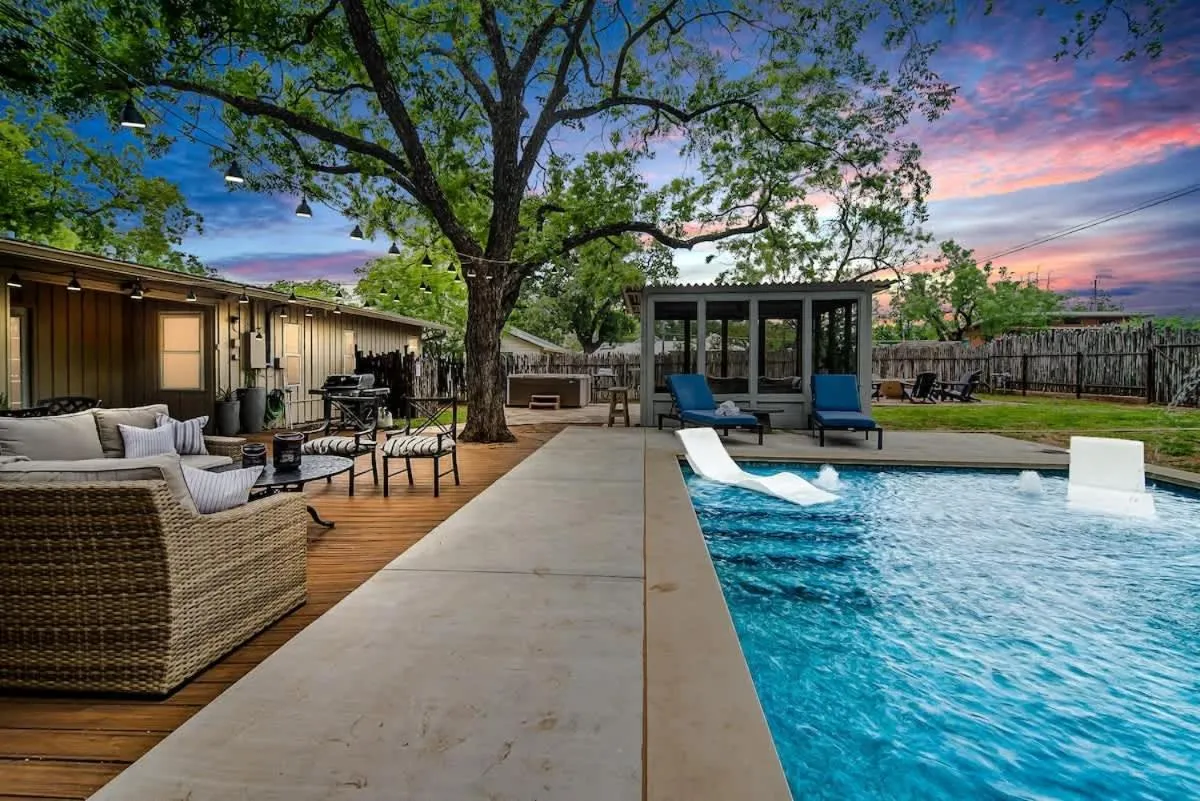 Swimming pool in Backyard Oasis w/Pool, Hot-Tub, Grill & Fire Pit!