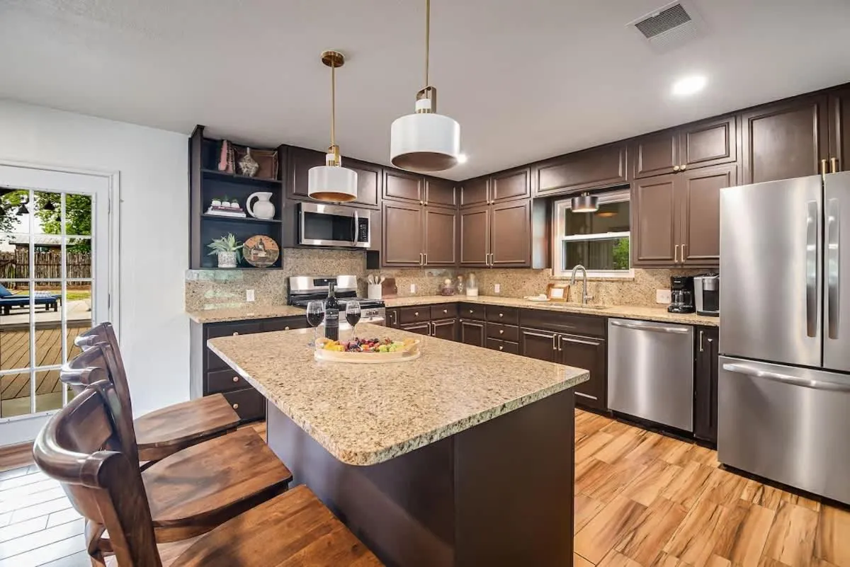 Kitchen or kitchenette in Backyard Oasis w/Pool, Hot-Tub, Grill & Fire Pit!