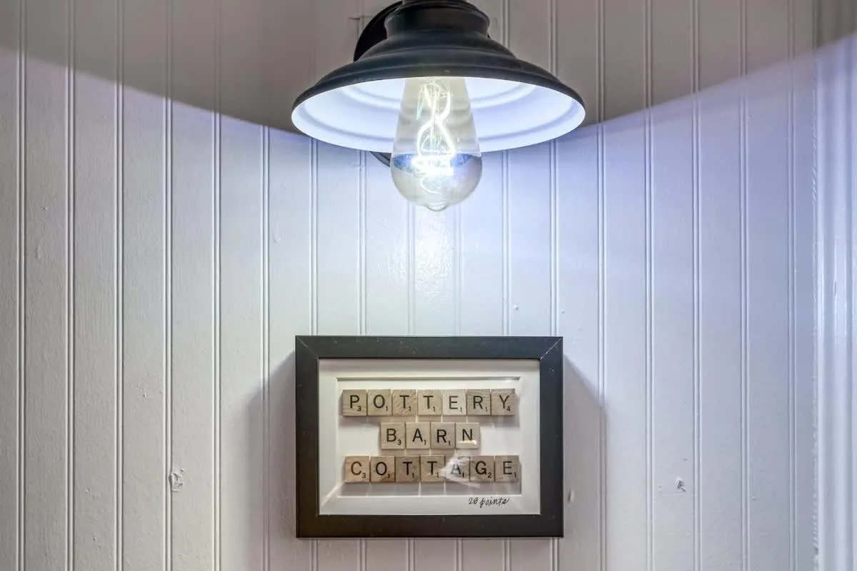 Property logo or sign in Charming Cottage Near Main with Patio&FirePit!!