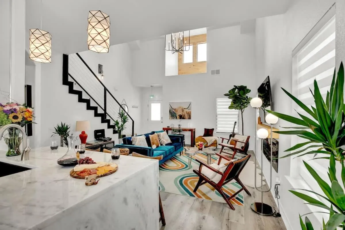 Living room in Luxury Modern Home with Hot tub Deck & Firepit!