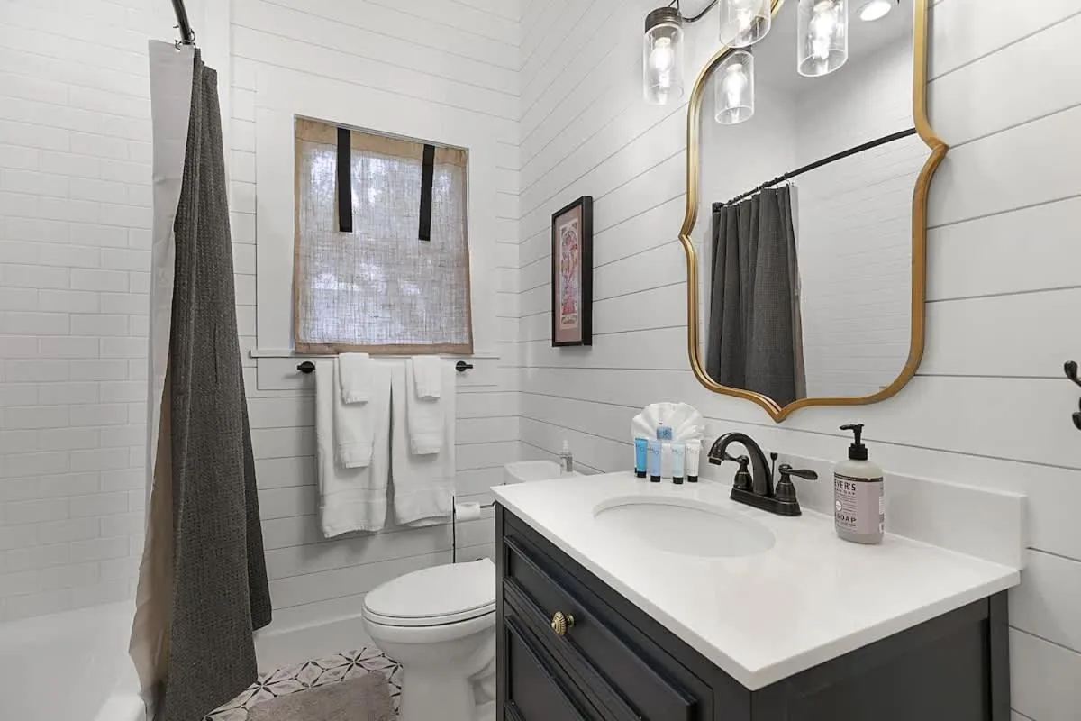 Toilet in Stunning Home with Hot Tub & Grill Just 2 Blks from Main St!