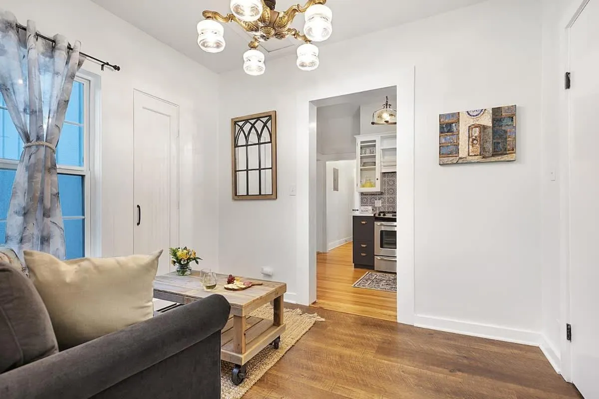 Living room in Stunning Home with Hot Tub & Grill Just 2 Blks from Main St!