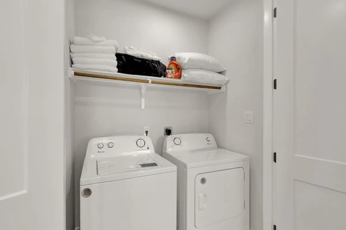 laundry in Stunning Lake Home with Pool-Beach-Gym-Boat Access