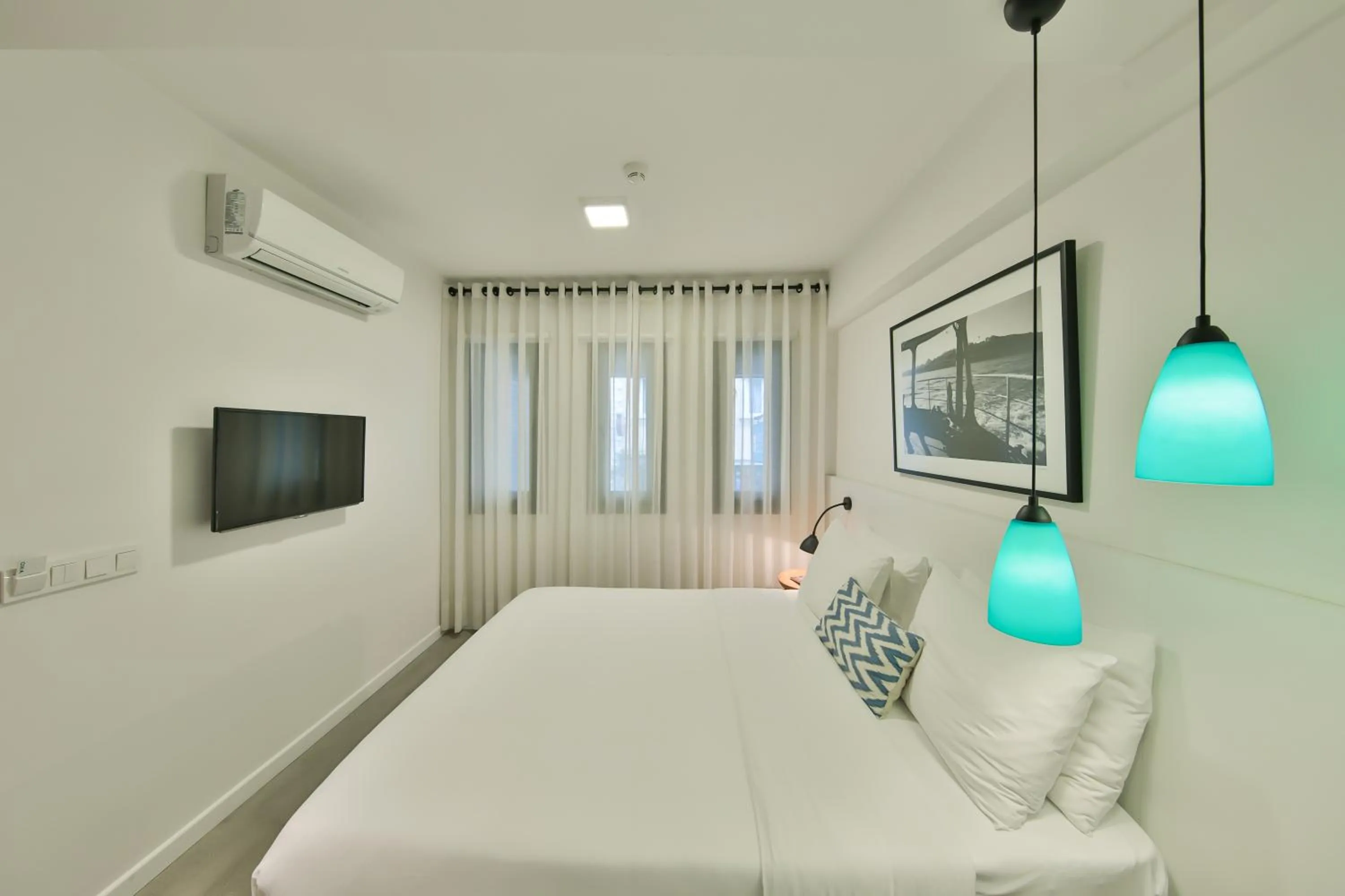 Bed in Alilass Hotel