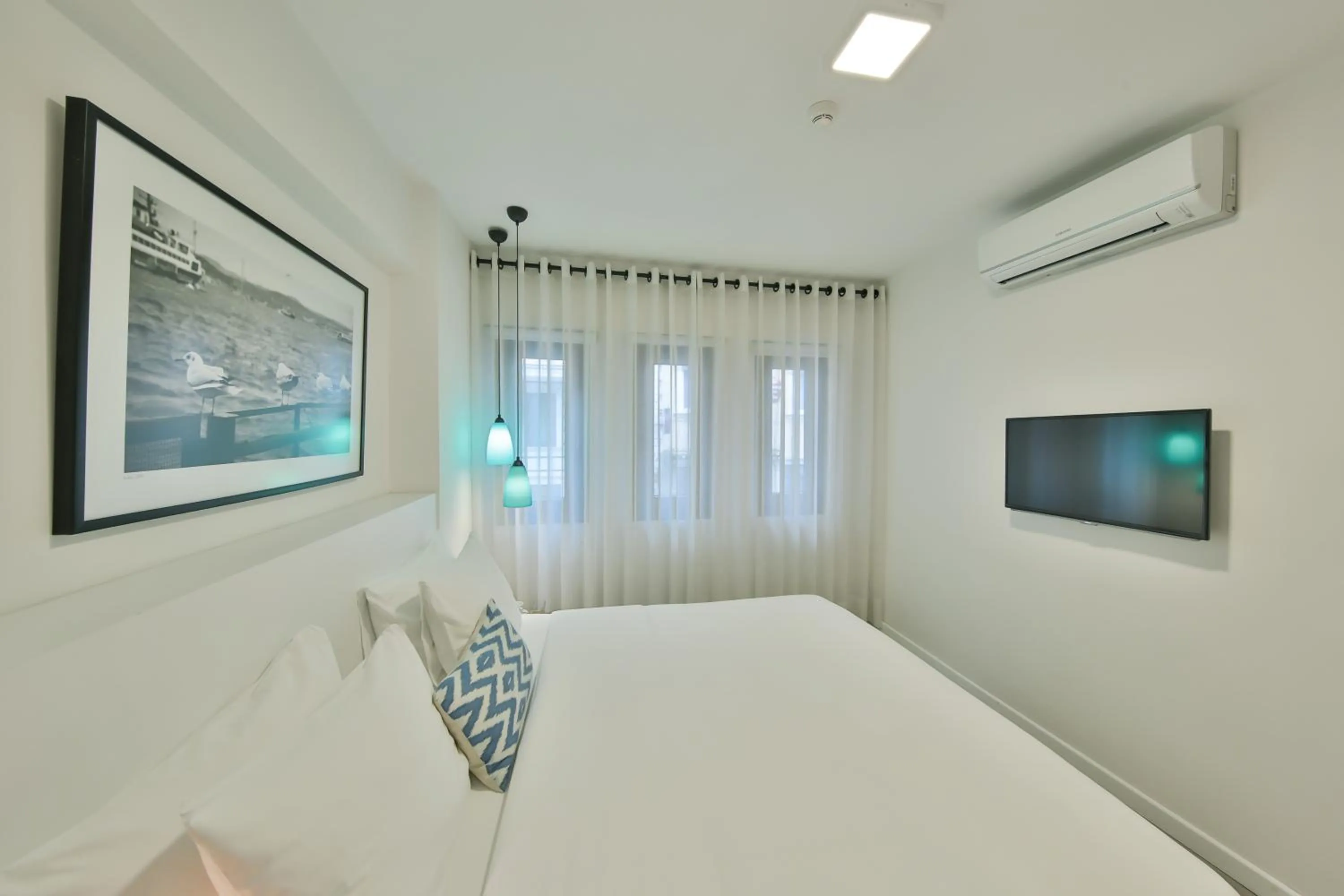 Bed in Alilass Hotel