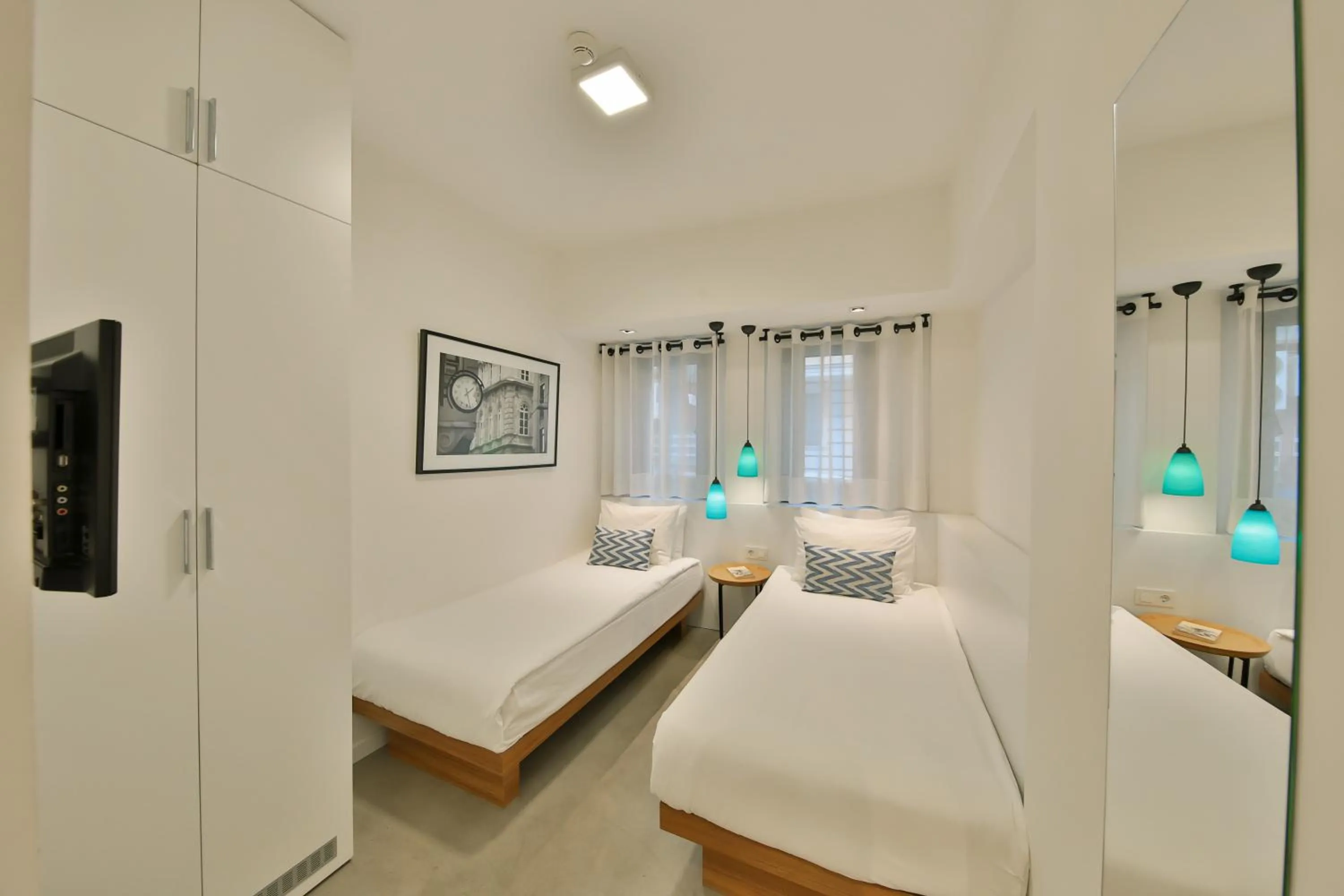 Bed in Alilass Hotel