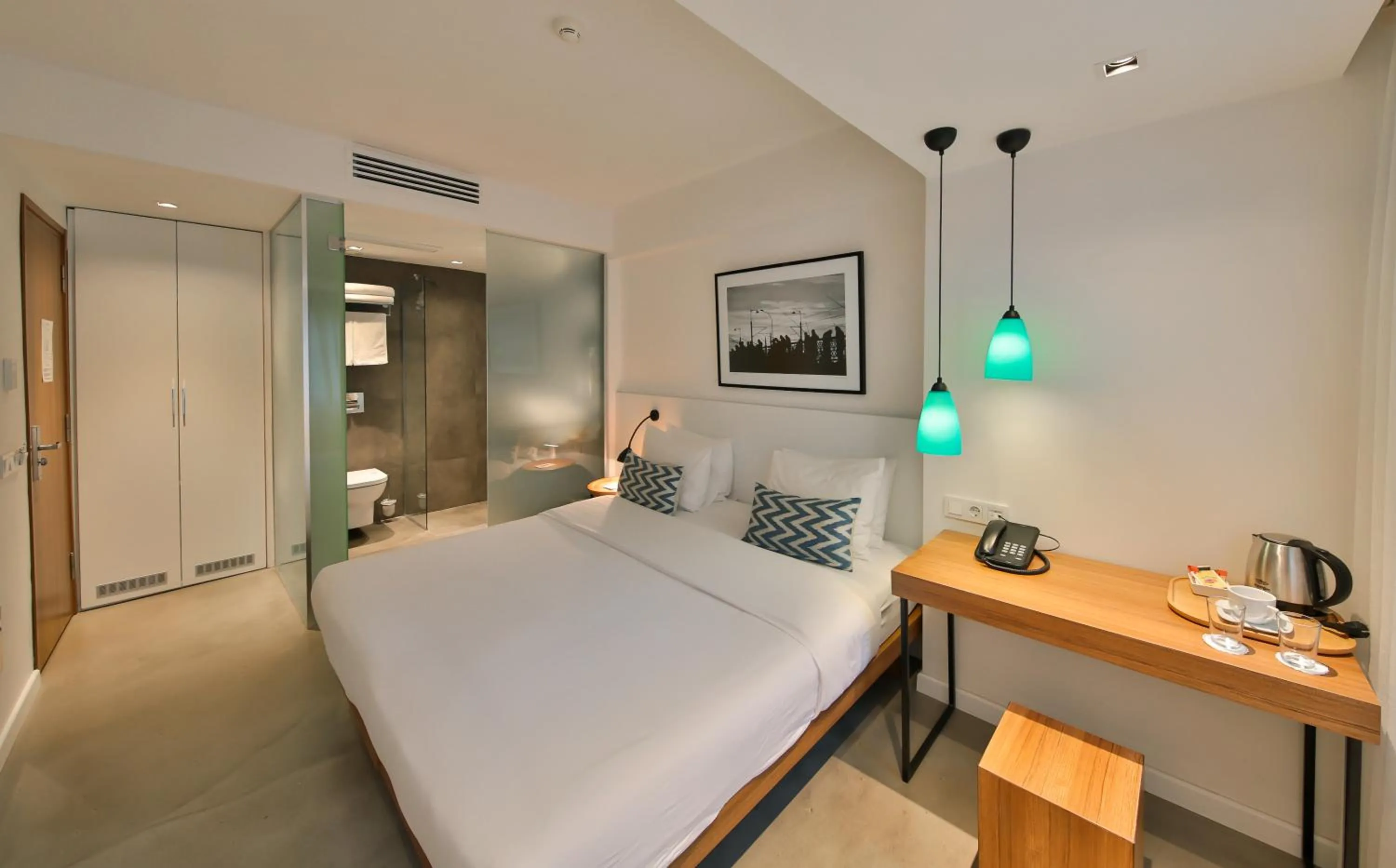 Bed in Alilass Hotel