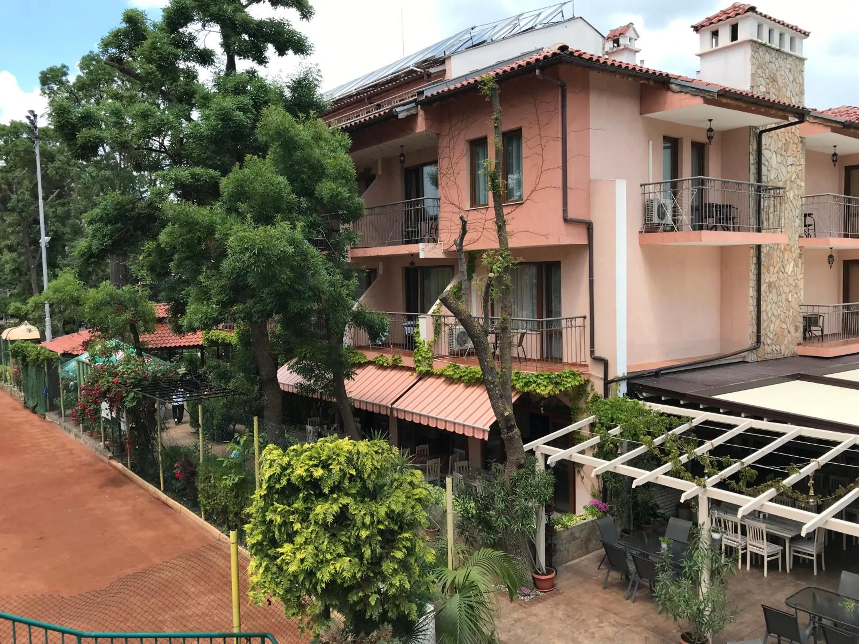 Property building in Oleander House and Tennis Club