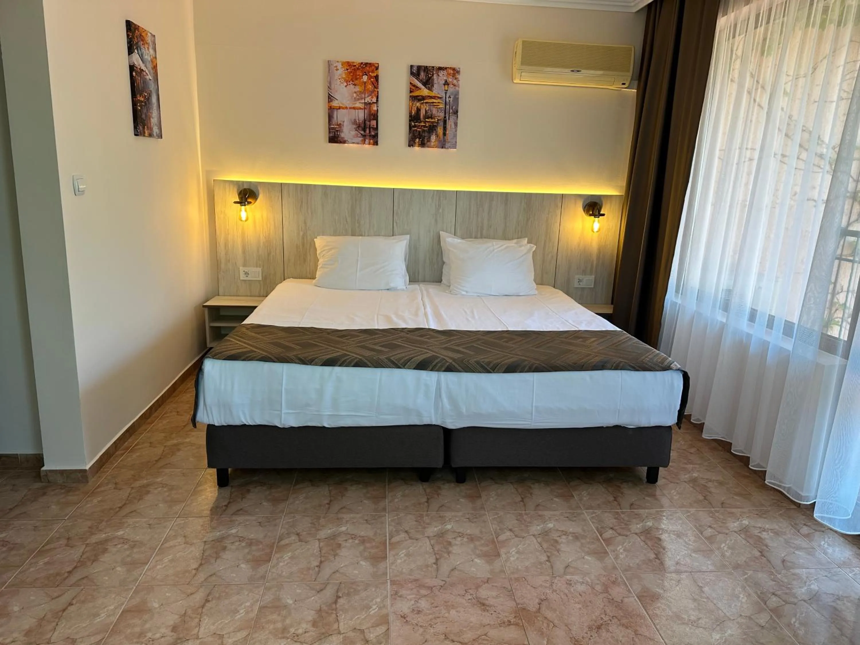 Bed in Oleander House and Tennis Club