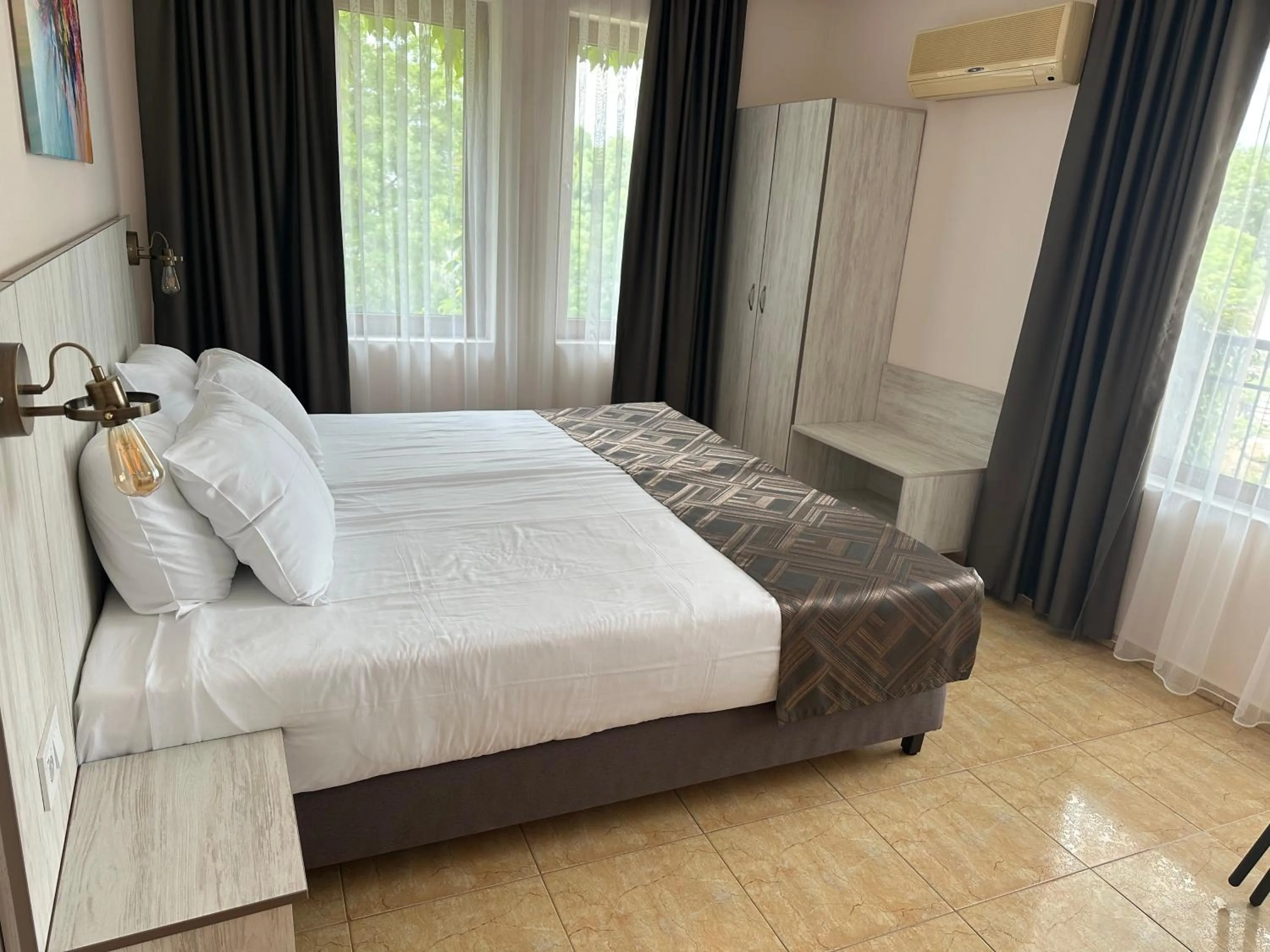 Bed in Oleander House and Tennis Club