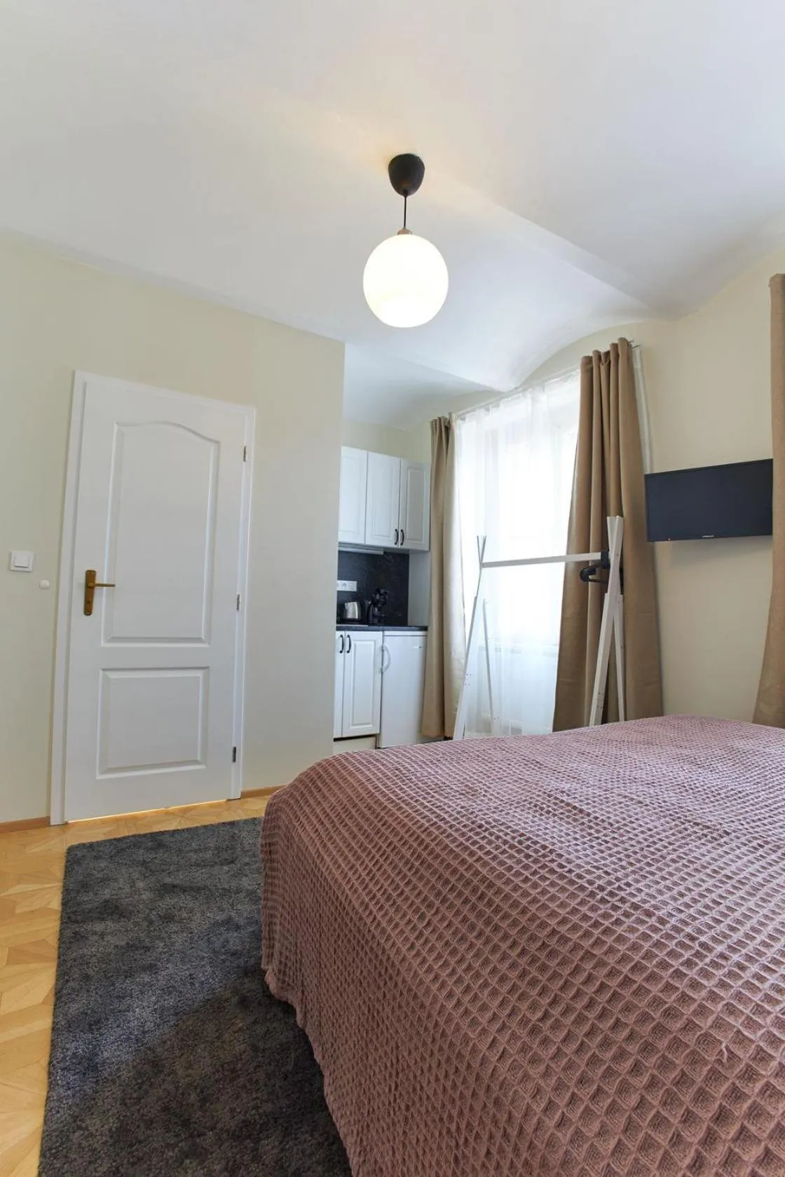 Bed in River View Residence by Charles Bridge