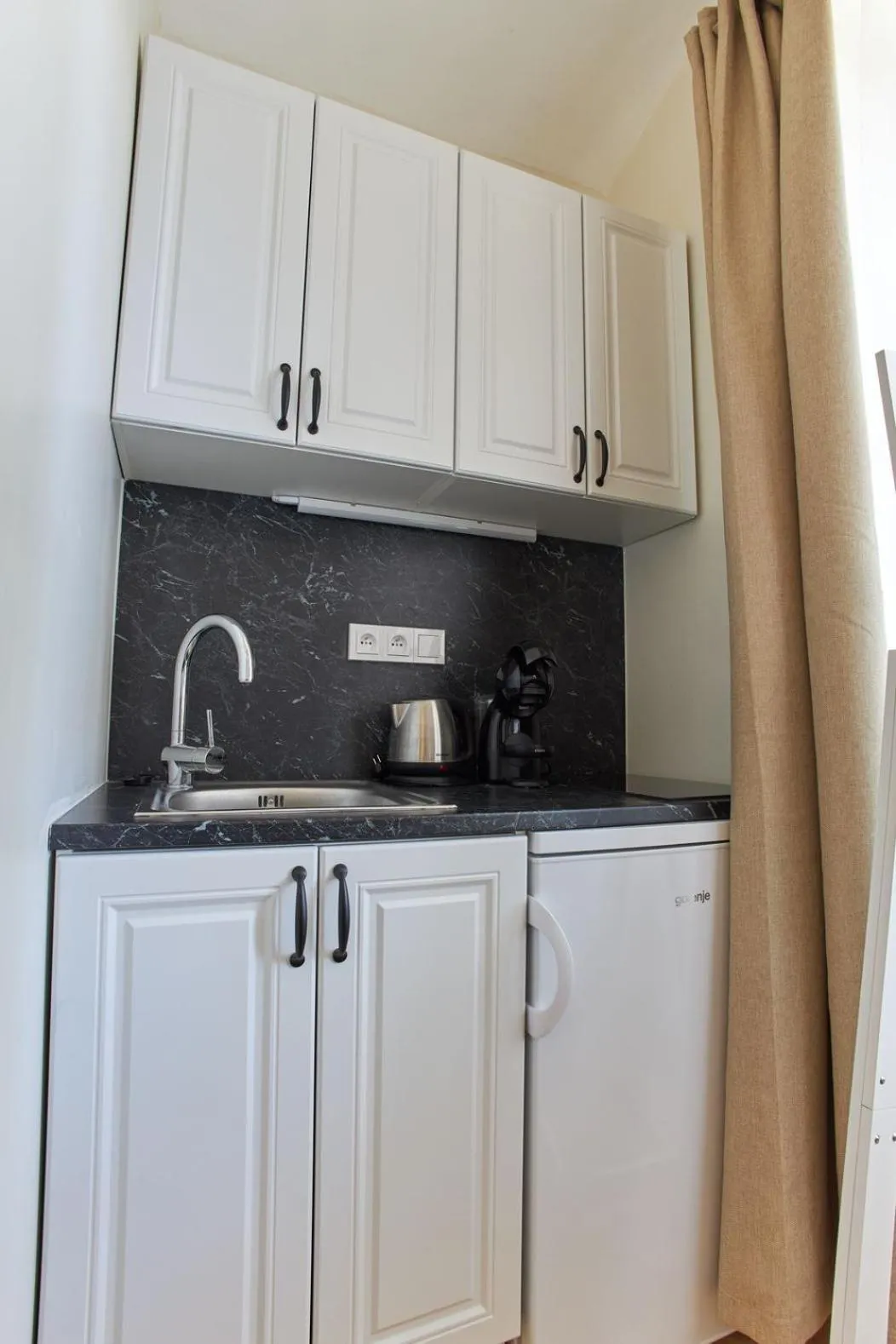 Kitchen or kitchenette in River View Residence by Charles Bridge