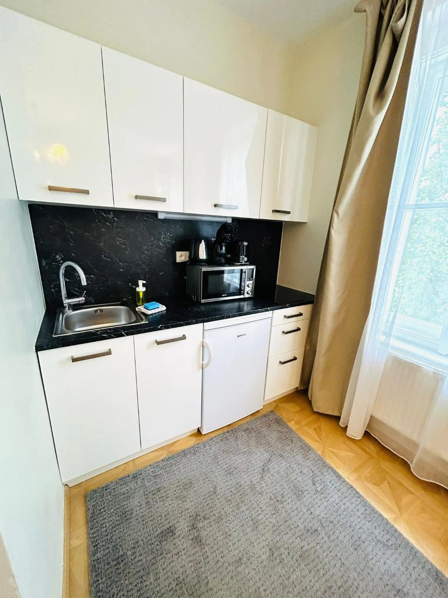 Kitchen or kitchenette in River View Residence by Charles Bridge