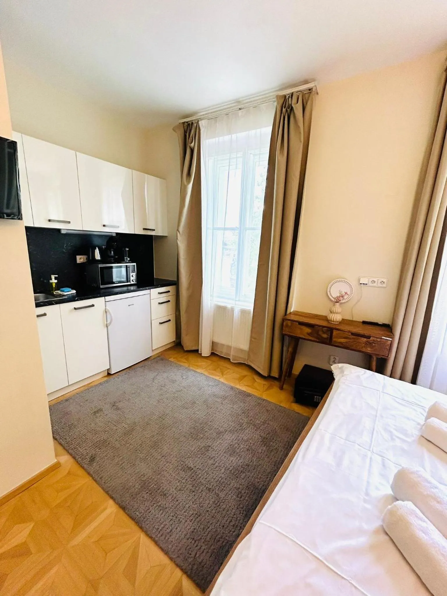 Bed in River View Residence by Charles Bridge