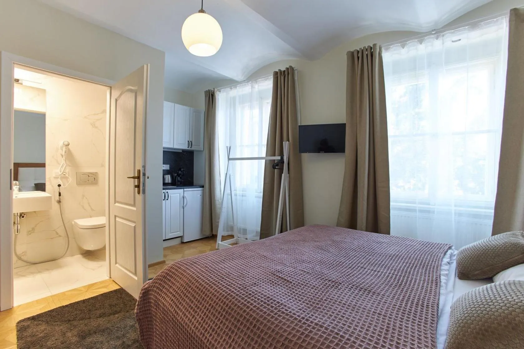 Bed in River View Residence by Charles Bridge