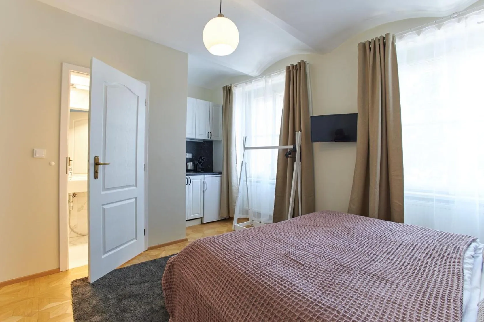 Bed in River View Residence by Charles Bridge