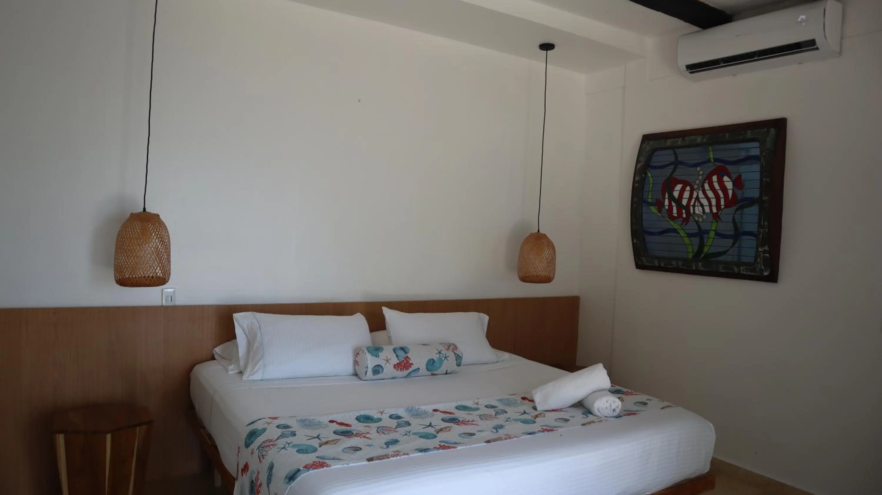 Bed in Hotel Rosario de Mar by Tequendama