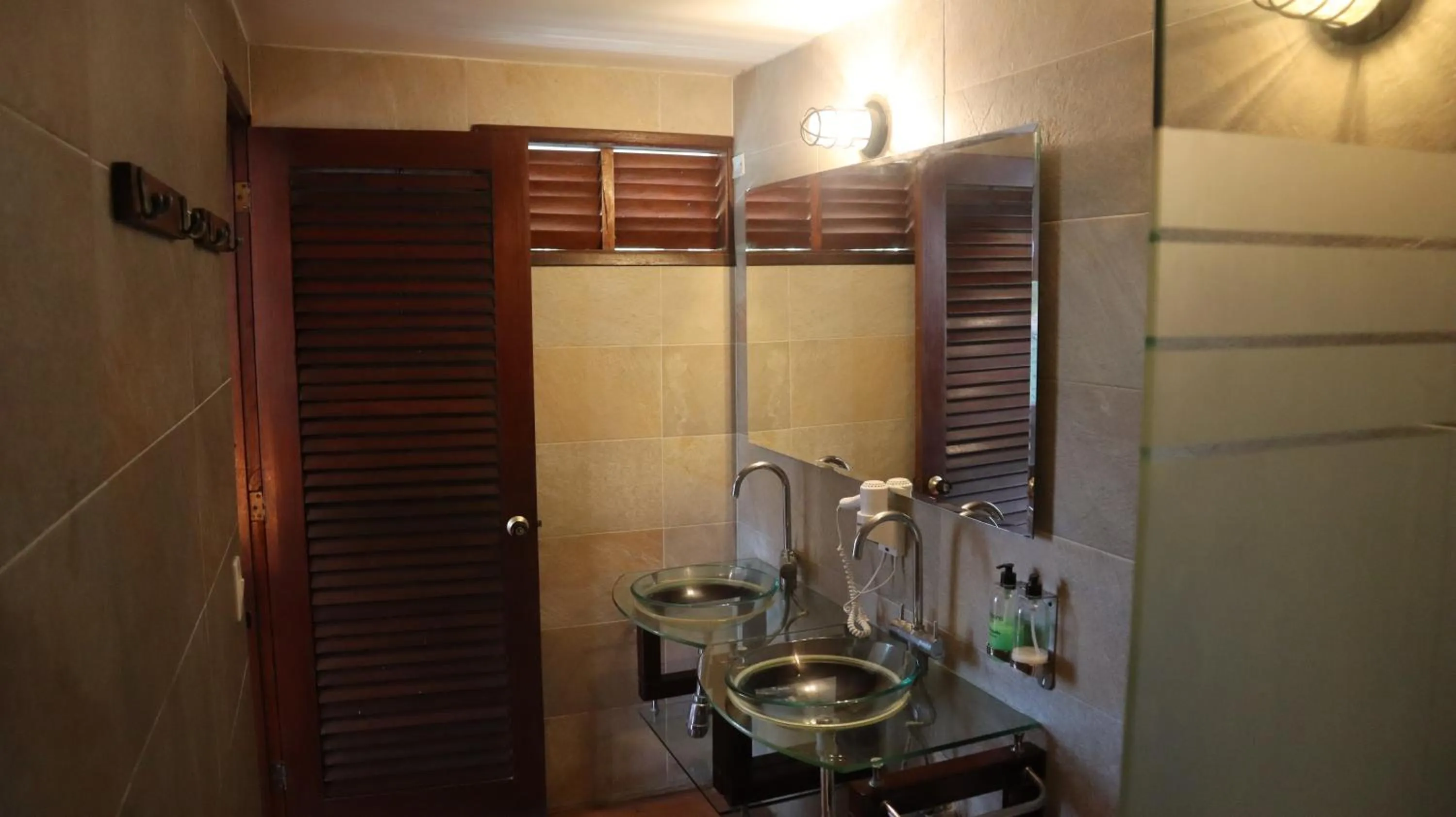 Bathroom in Hotel Rosario de Mar by Tequendama