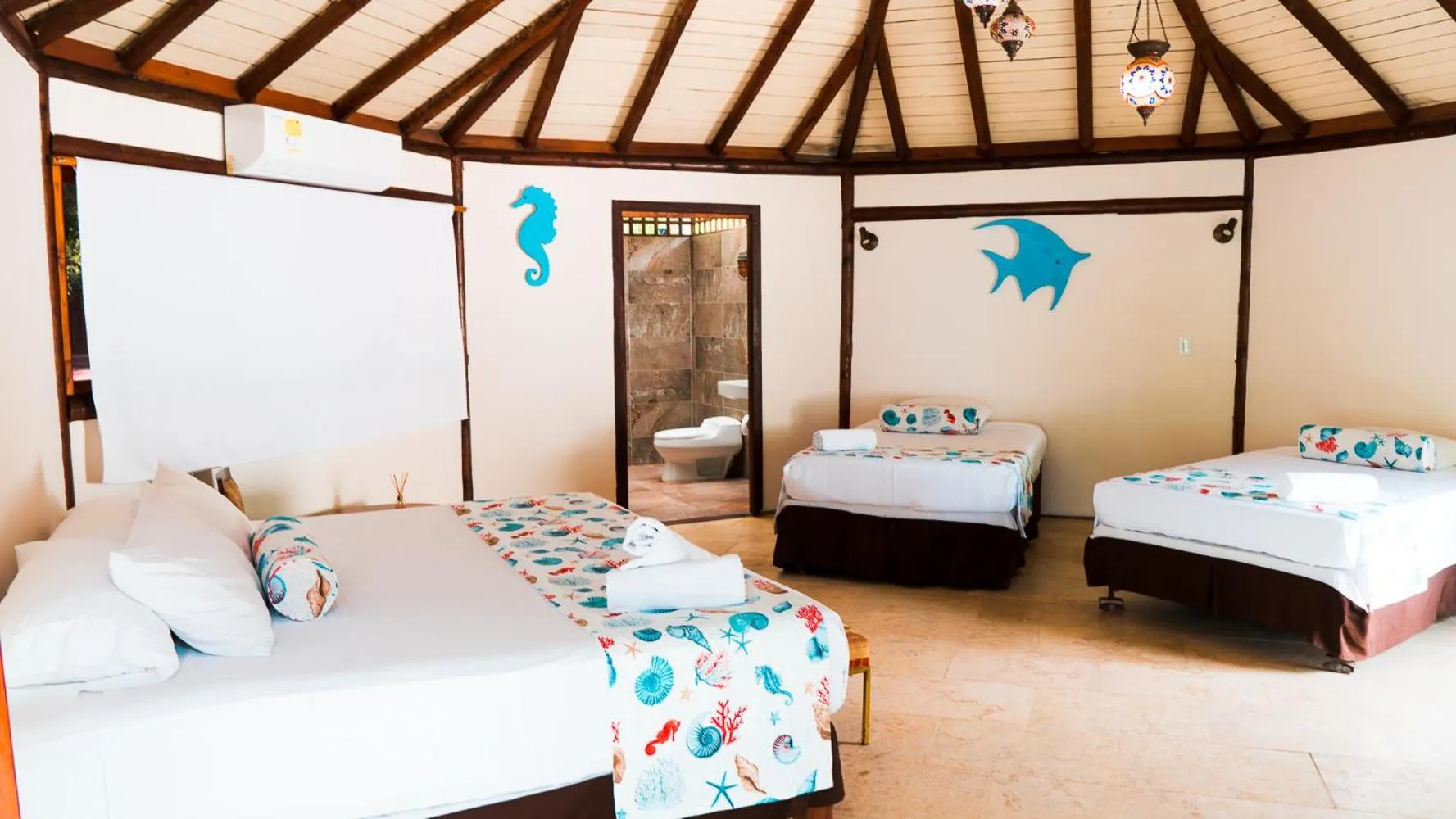 Bed in Hotel Rosario de Mar by Tequendama