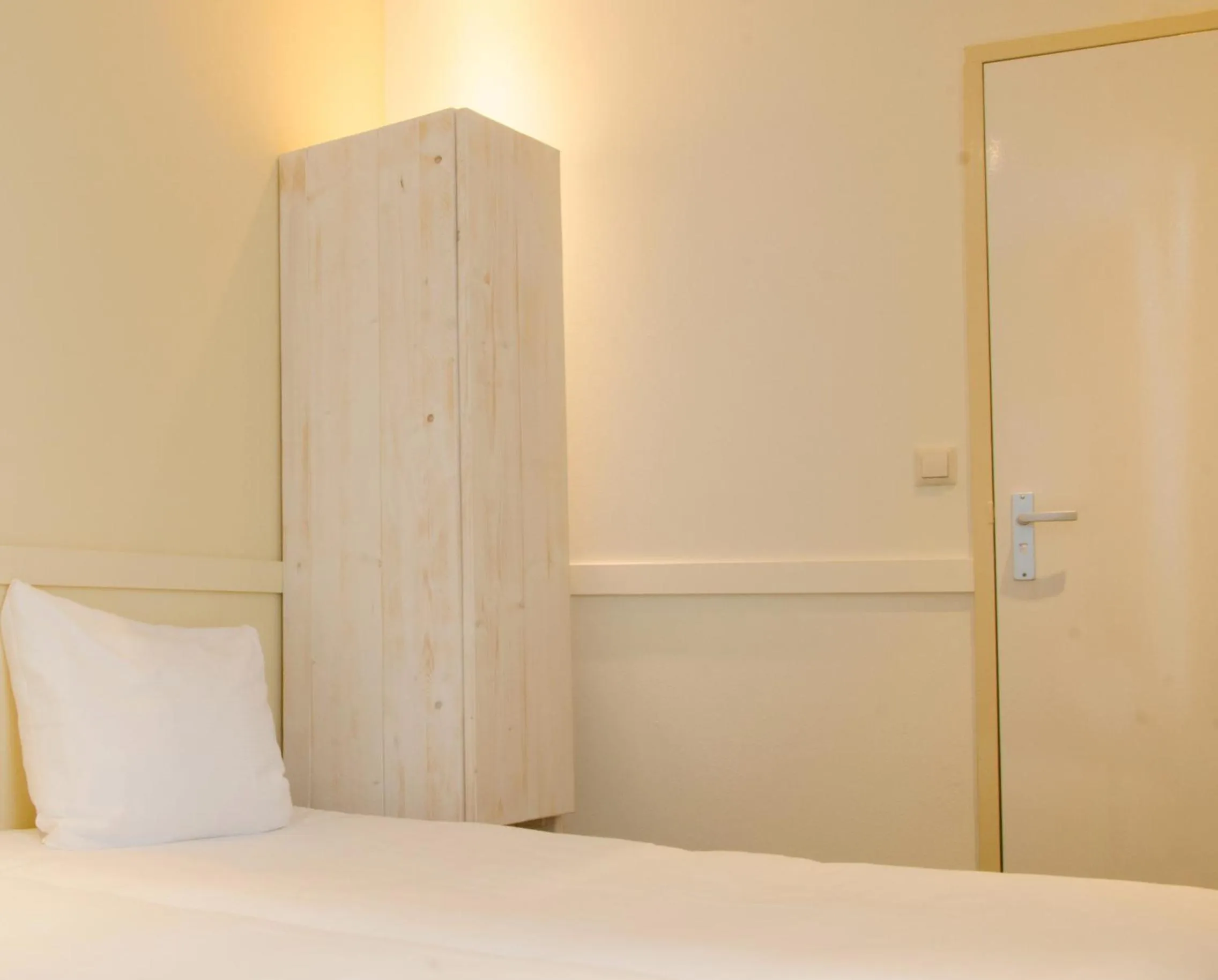 Bed in City2Beach Hotel