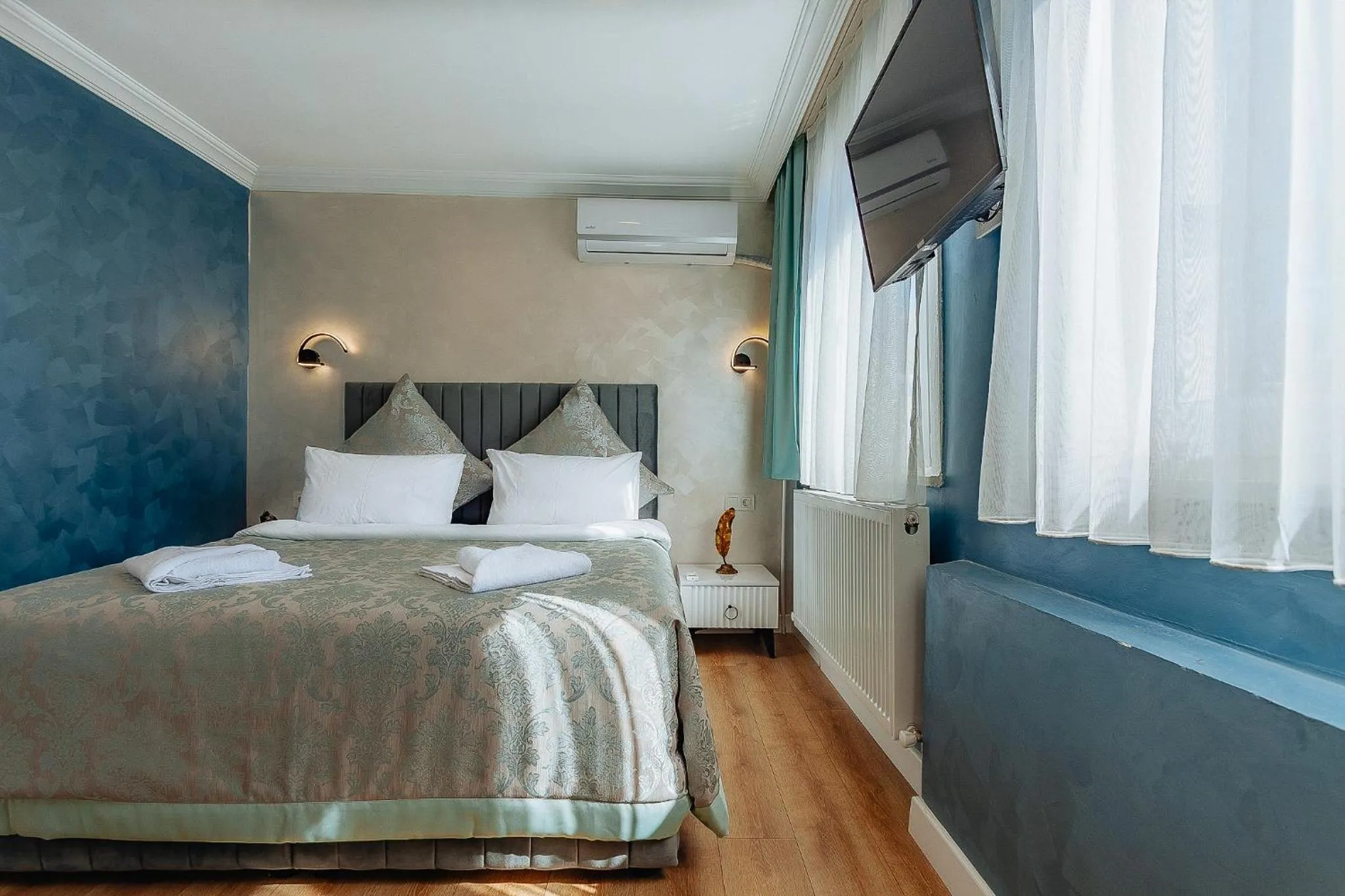 Bed in Taksim Bi Center Suites
