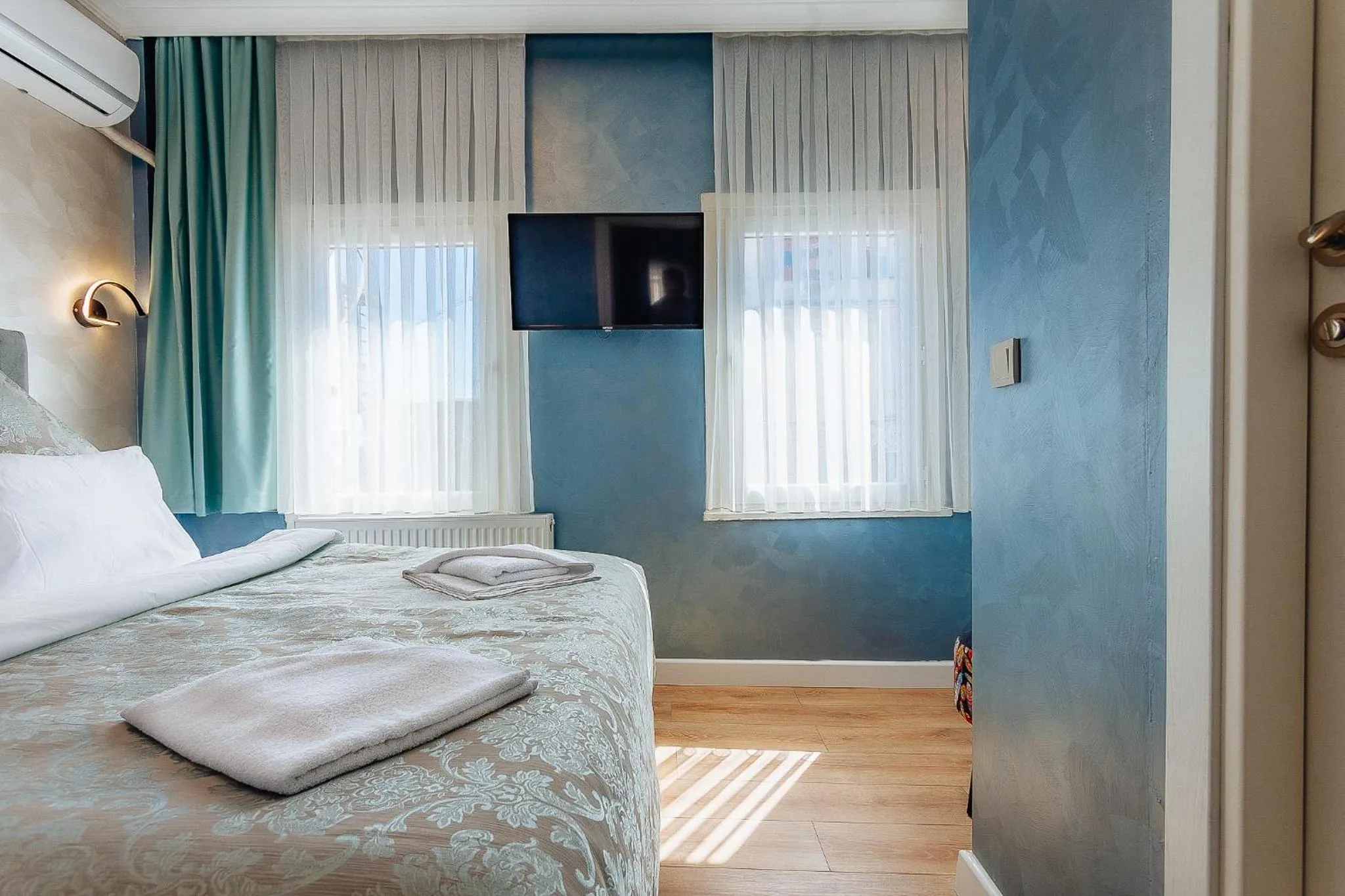 Bed in Taksim Bi Center Suites