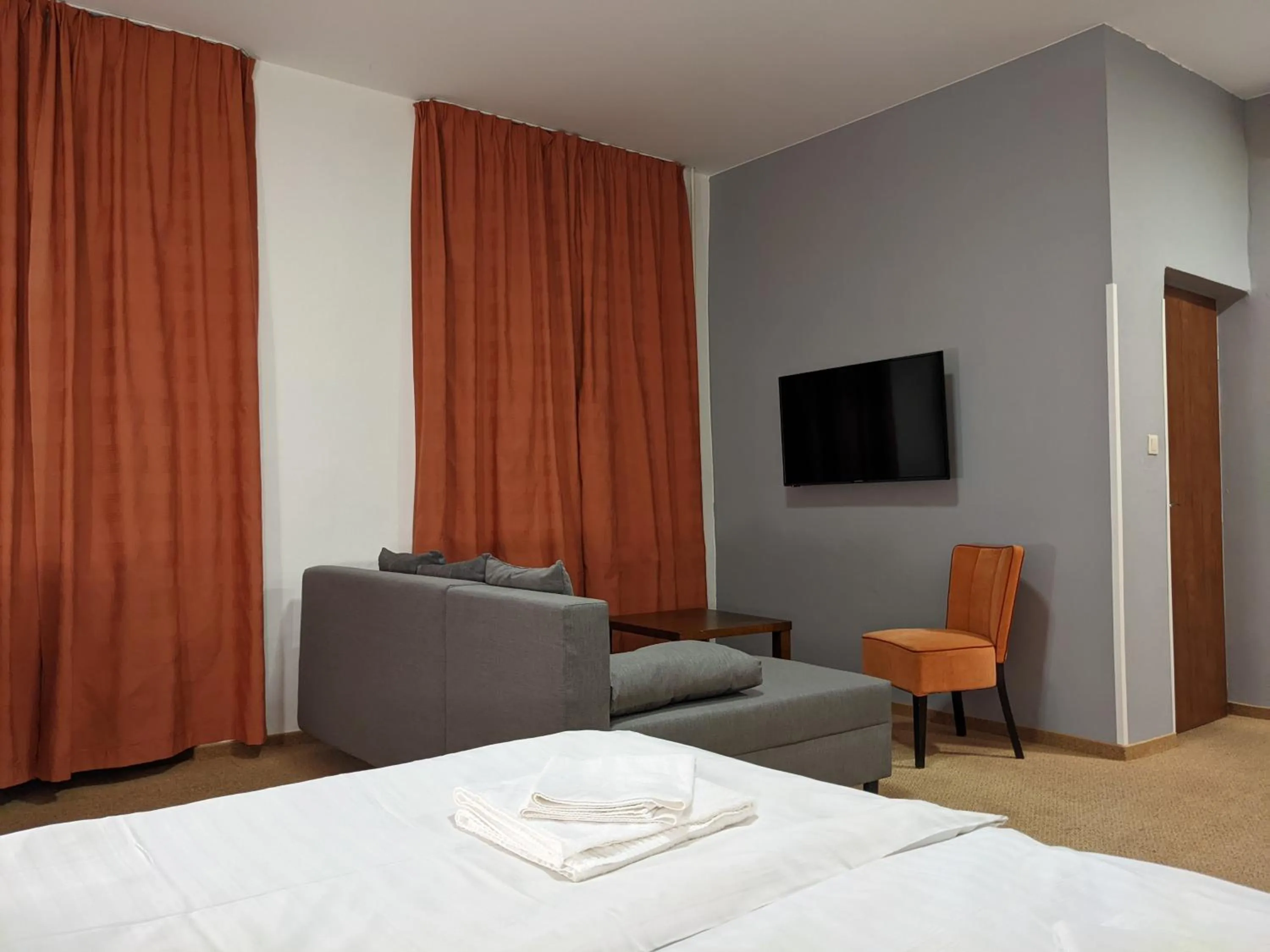 Bed in Garni Hotel Cosmopolitan