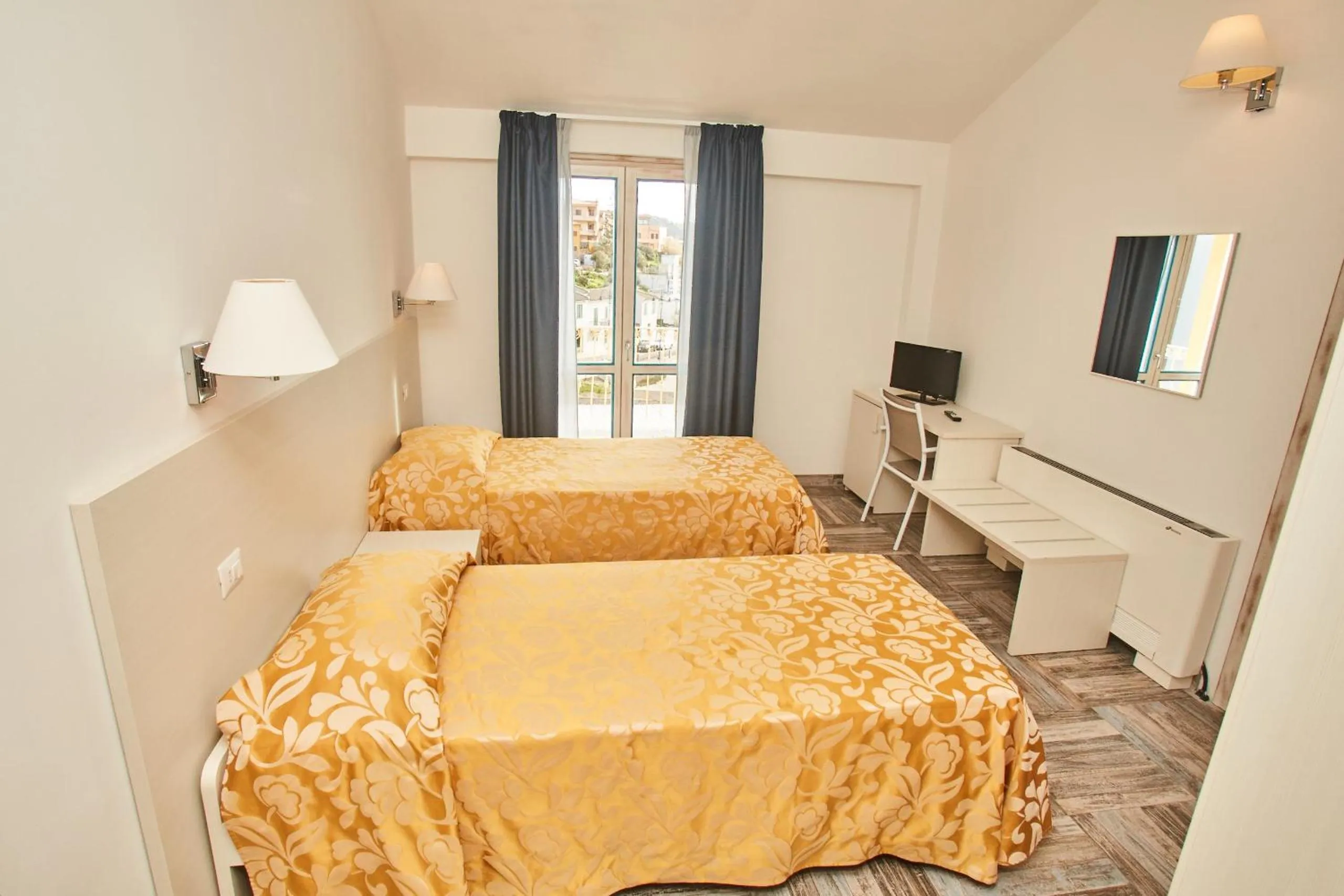 Bed in Hotel Muita di Mari