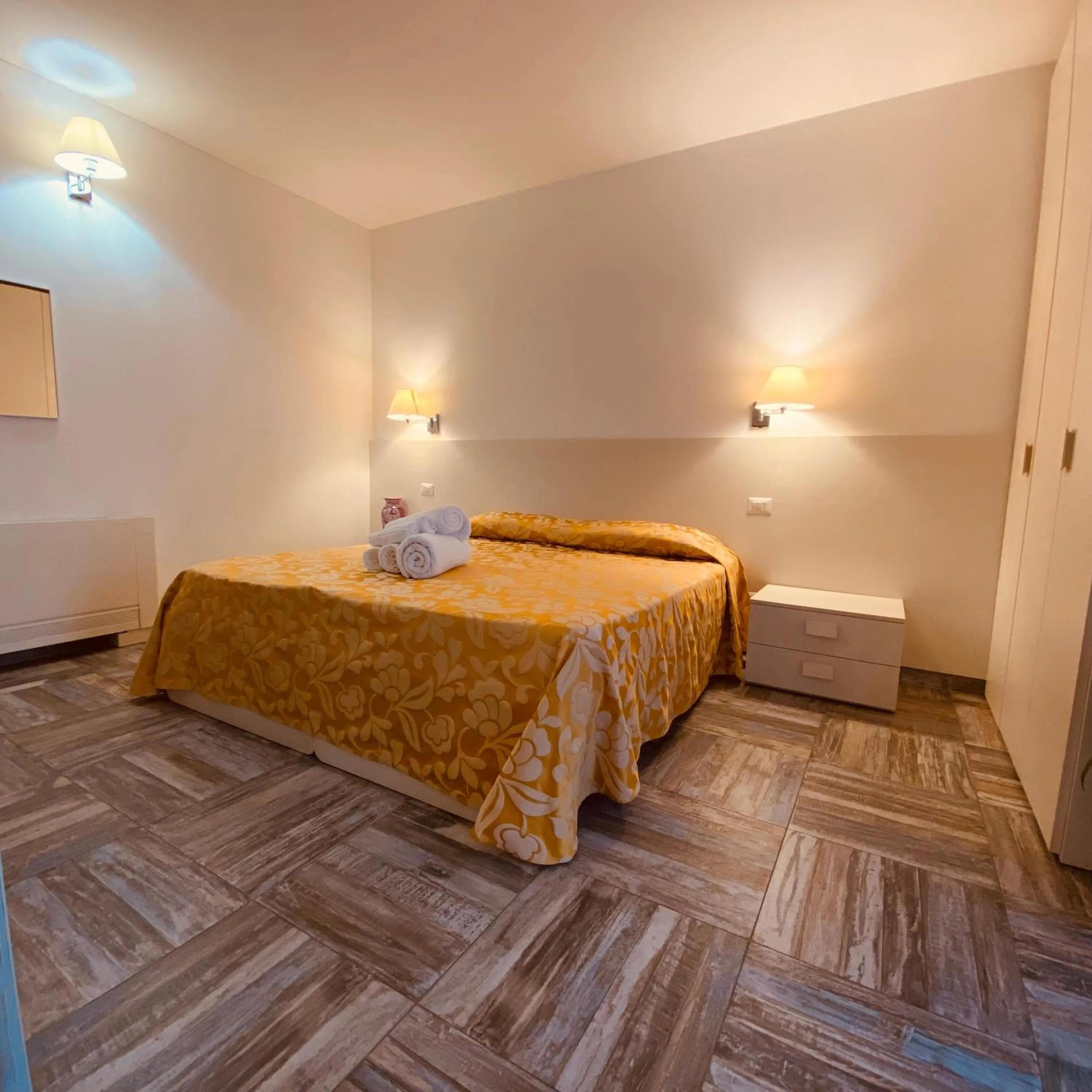 Bed in Hotel Muita di Mari