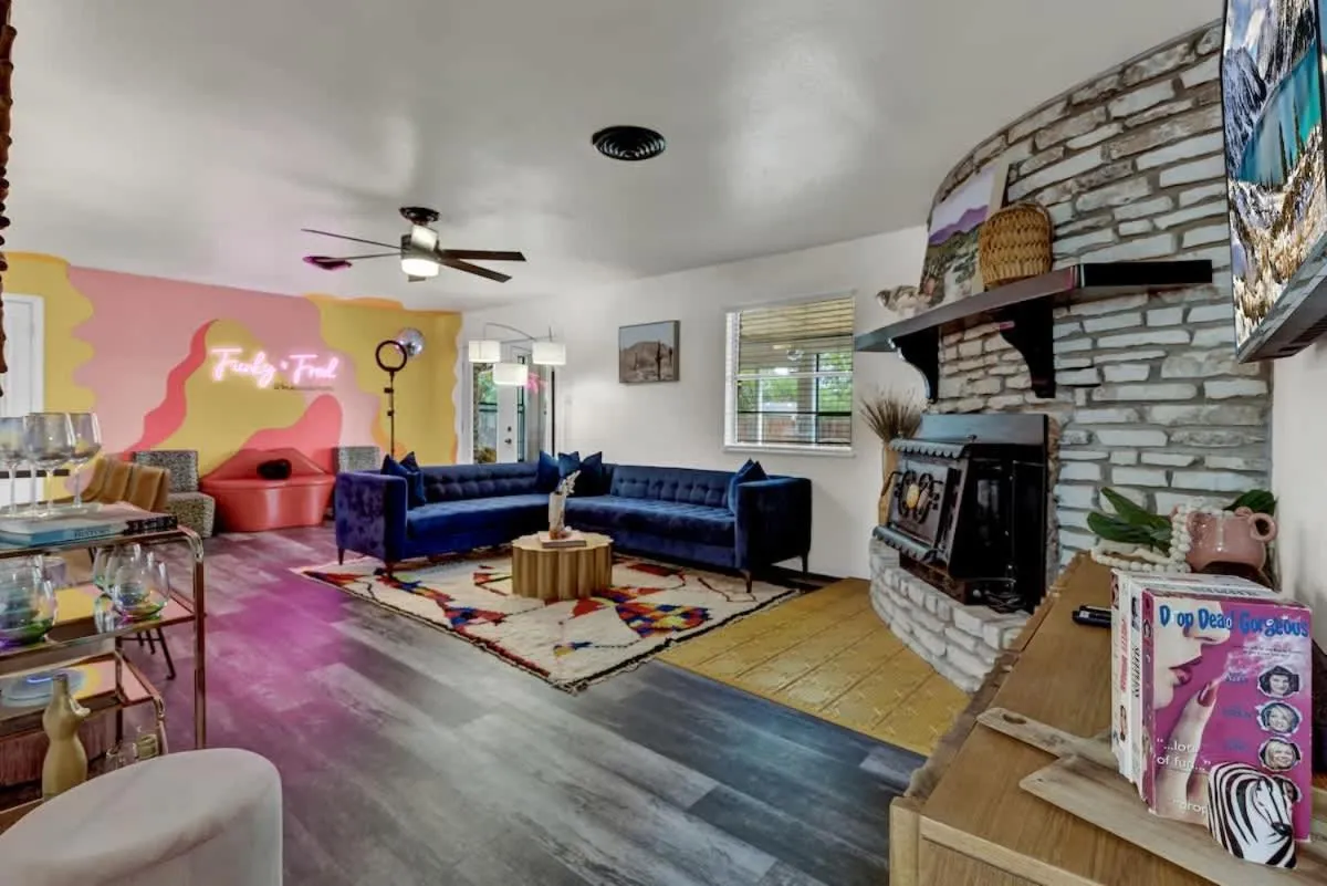Living room in Eclectic Fun Haus with Hot Tub - 3 Min Drive to Main