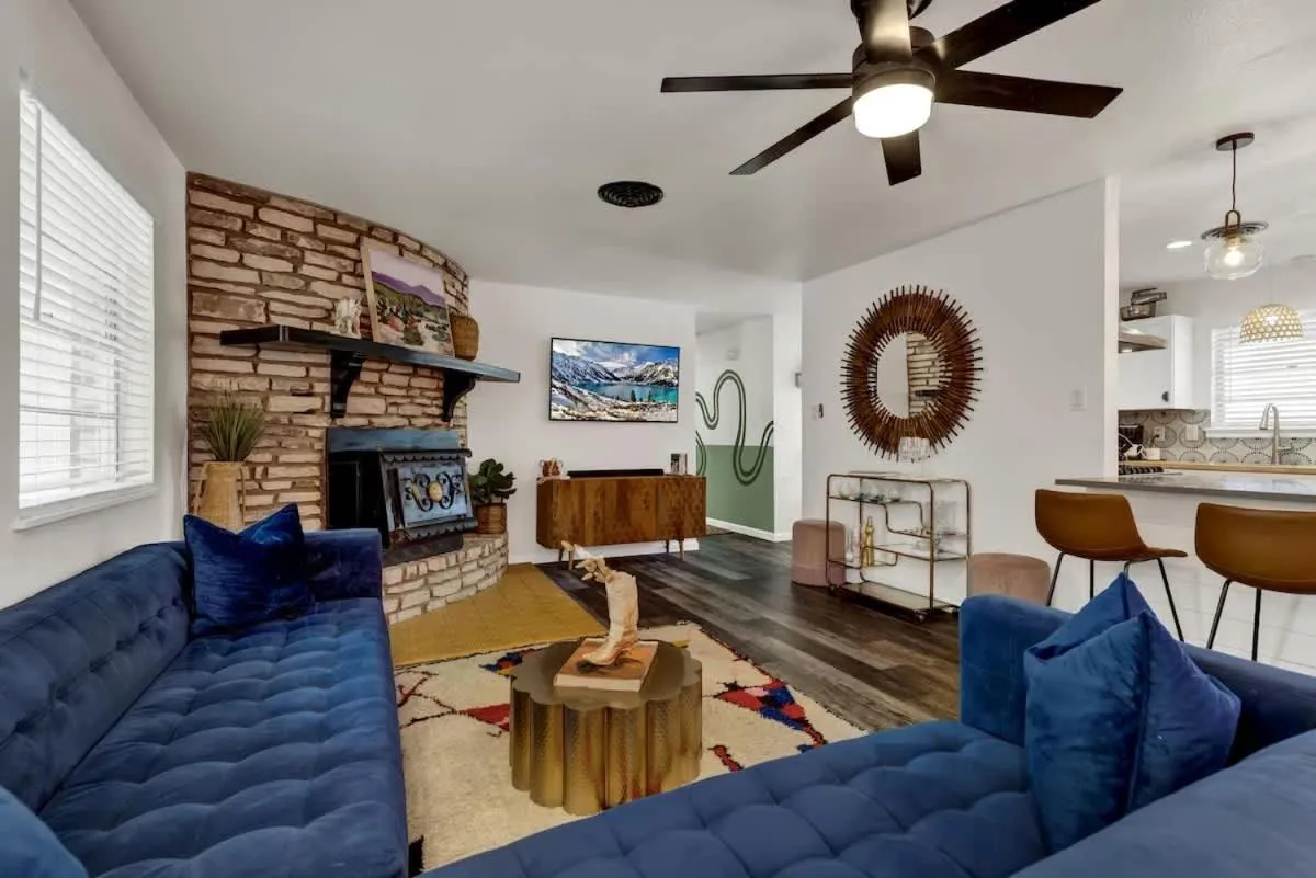 Living room in Eclectic Fun Haus with Hot Tub - 3 Min Drive to Main