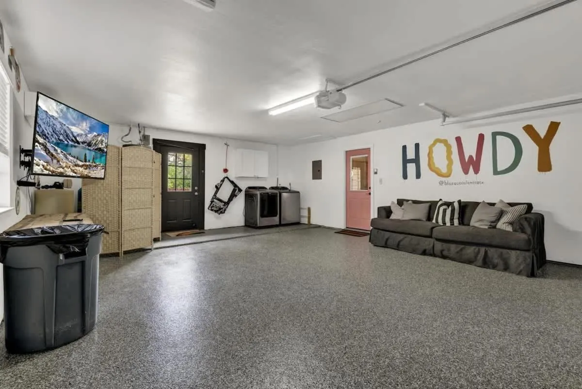 Living room in Eclectic Fun Haus with Hot Tub - 3 Min Drive to Main