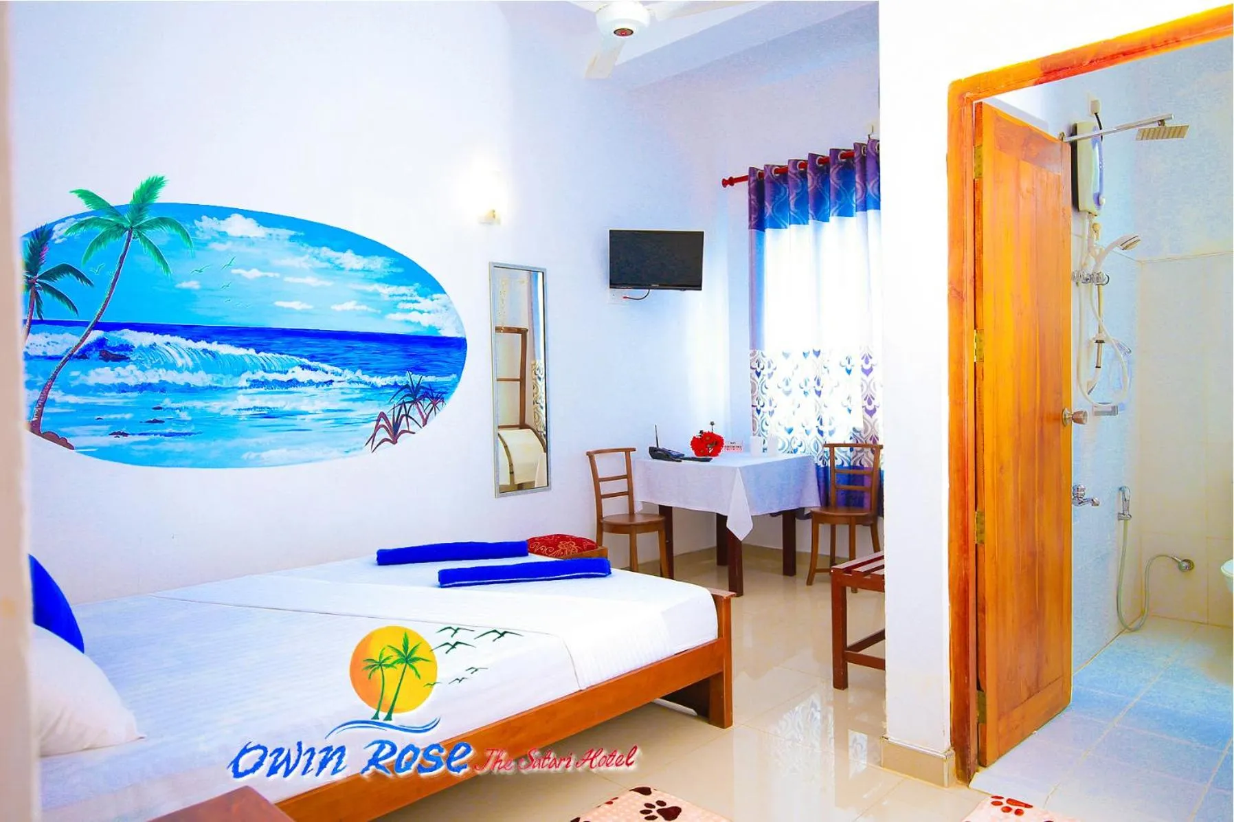 TV and multimedia, Bed in Owin Rose Yala Safari Hotel