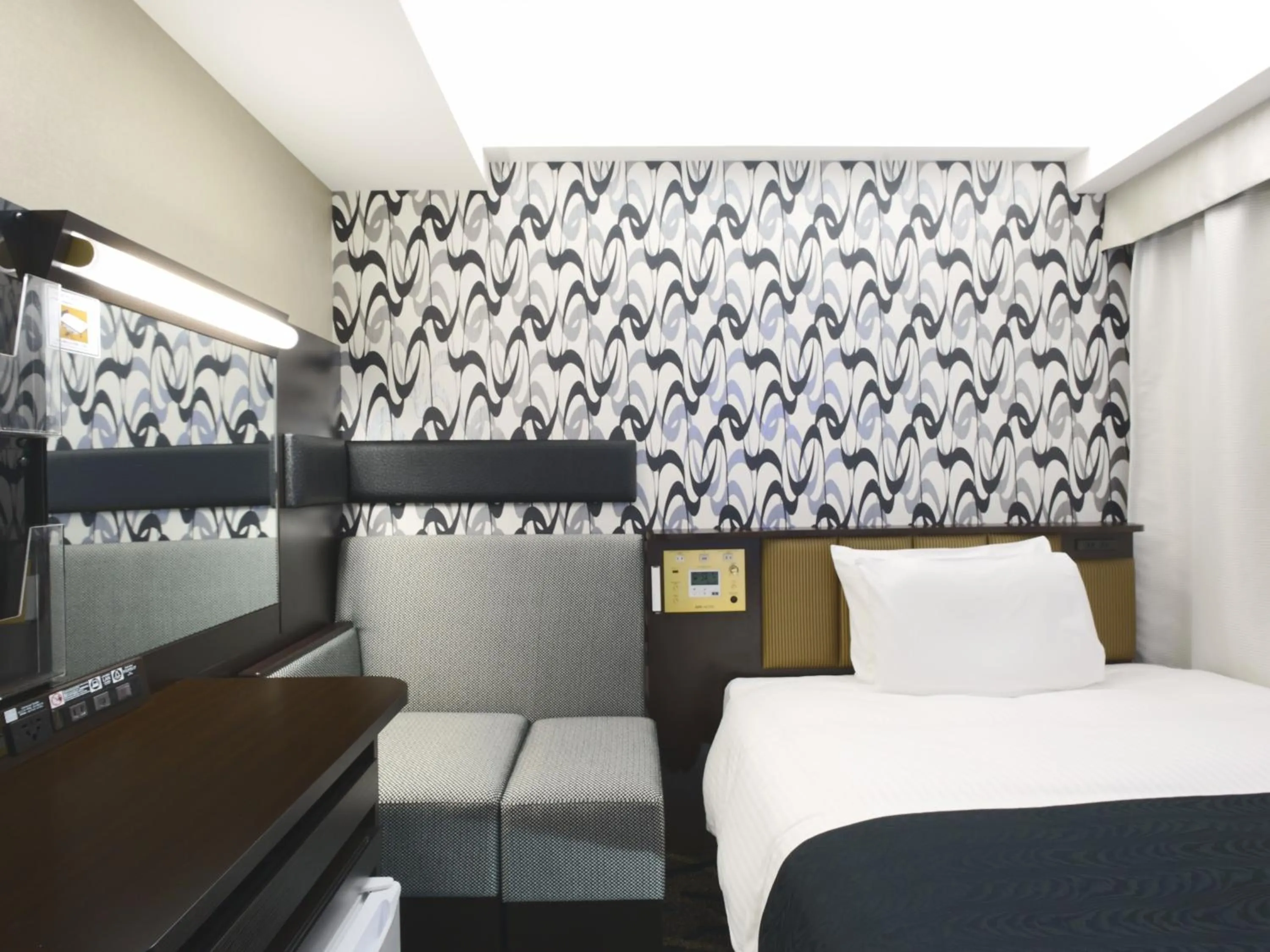 Photo of the whole room, Bed in APA Hotel Hatchobori Ekimae