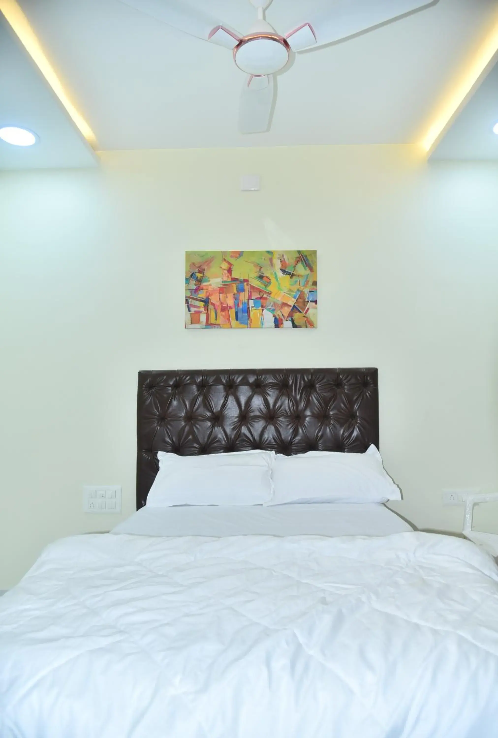 Bed in The Paradise Guest Inn Bed in The Paradise Guest Inn