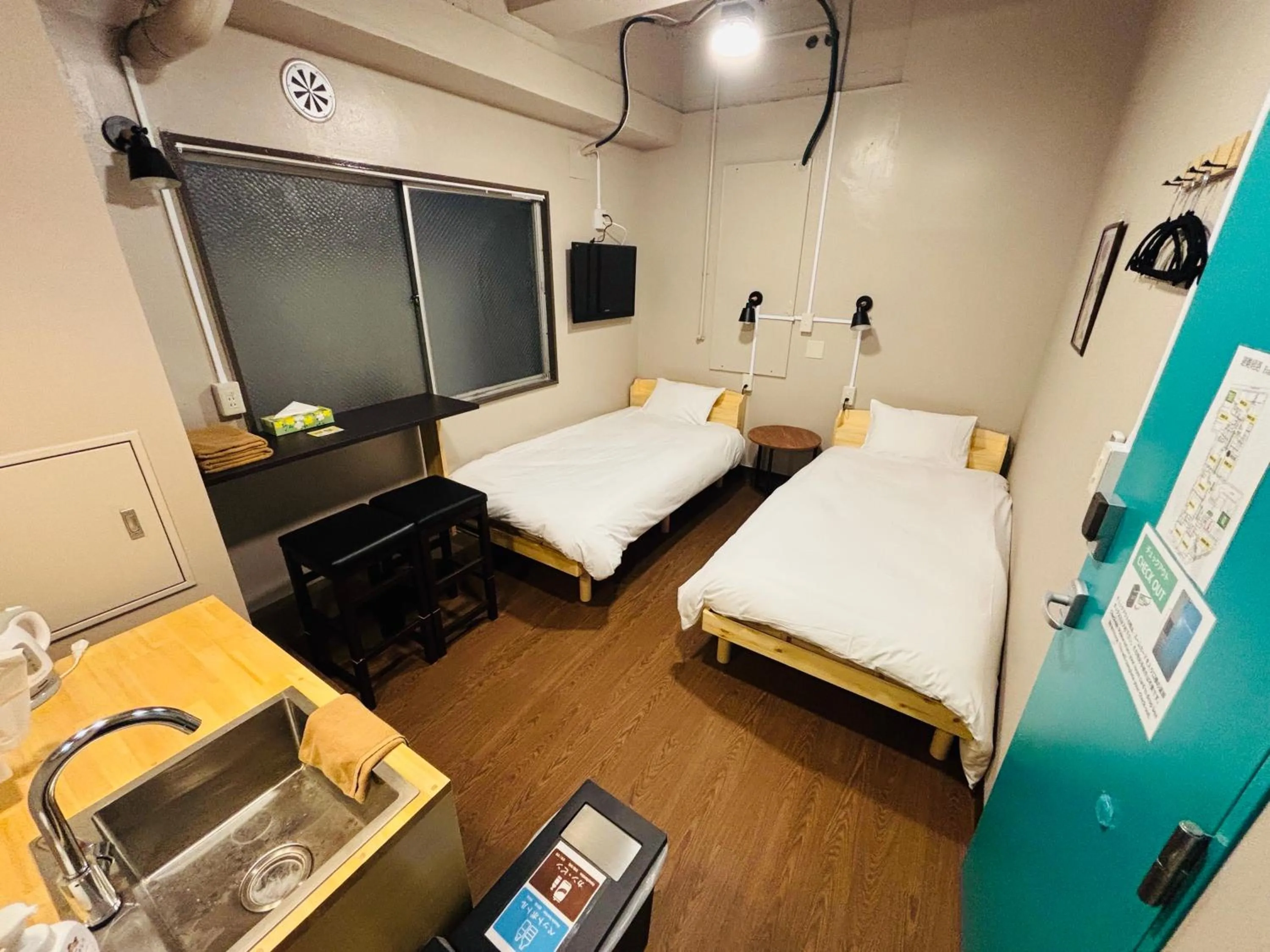 Bed in Wasabi Mita Hotel