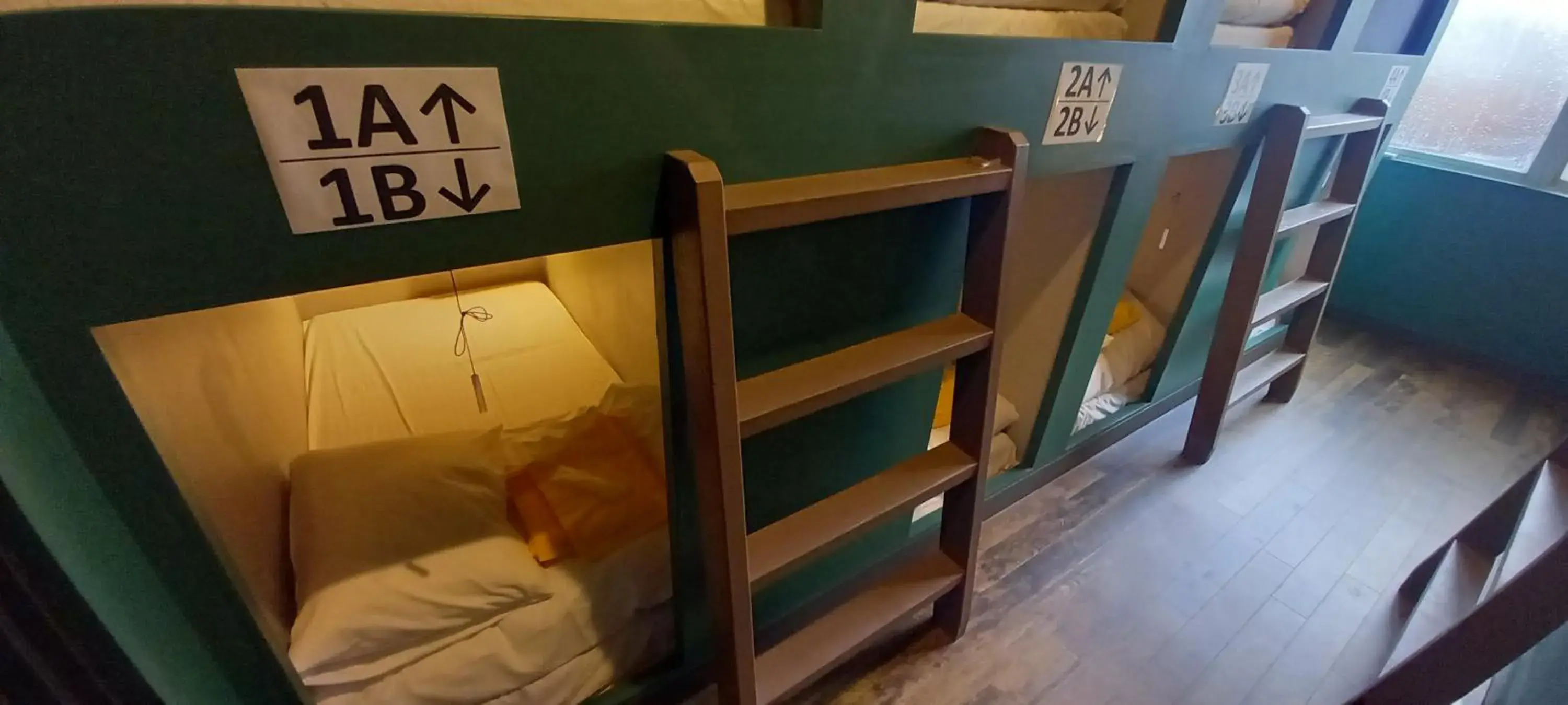 Bed in Wasabi Mita Hotel Bed in Wasabi Mita Hotel